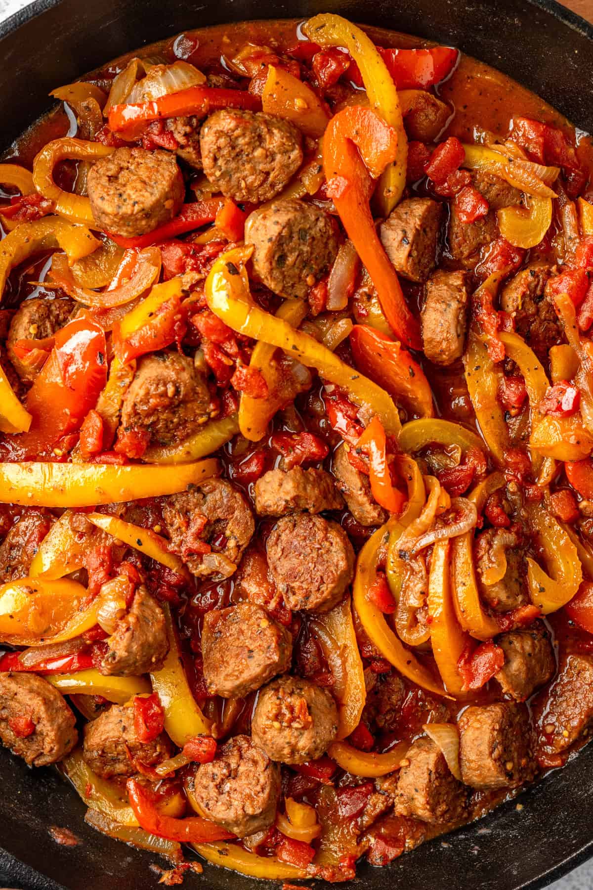 Beyond sausage, peppers, and onions in a skillet. 