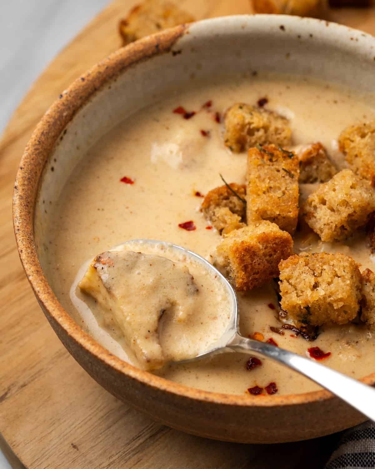 Roasted cauliflower soup in a bowl.