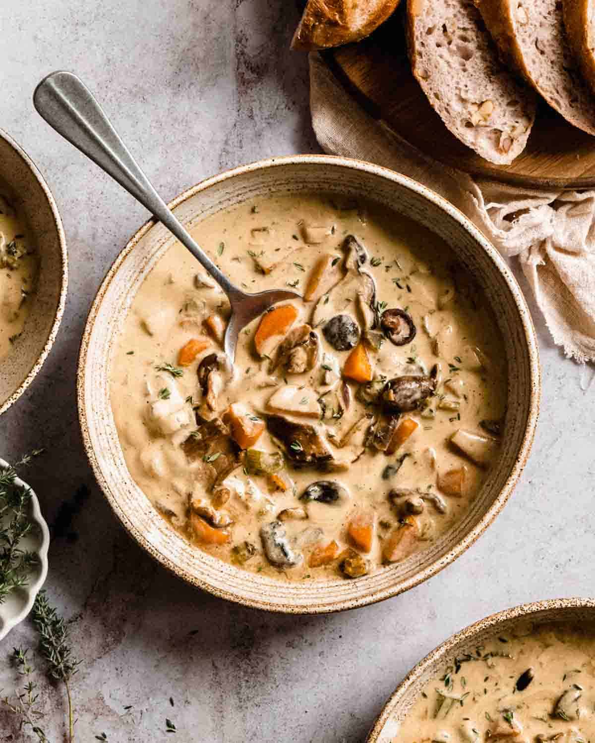 Creamy vegan mushroom soup in a bowl.