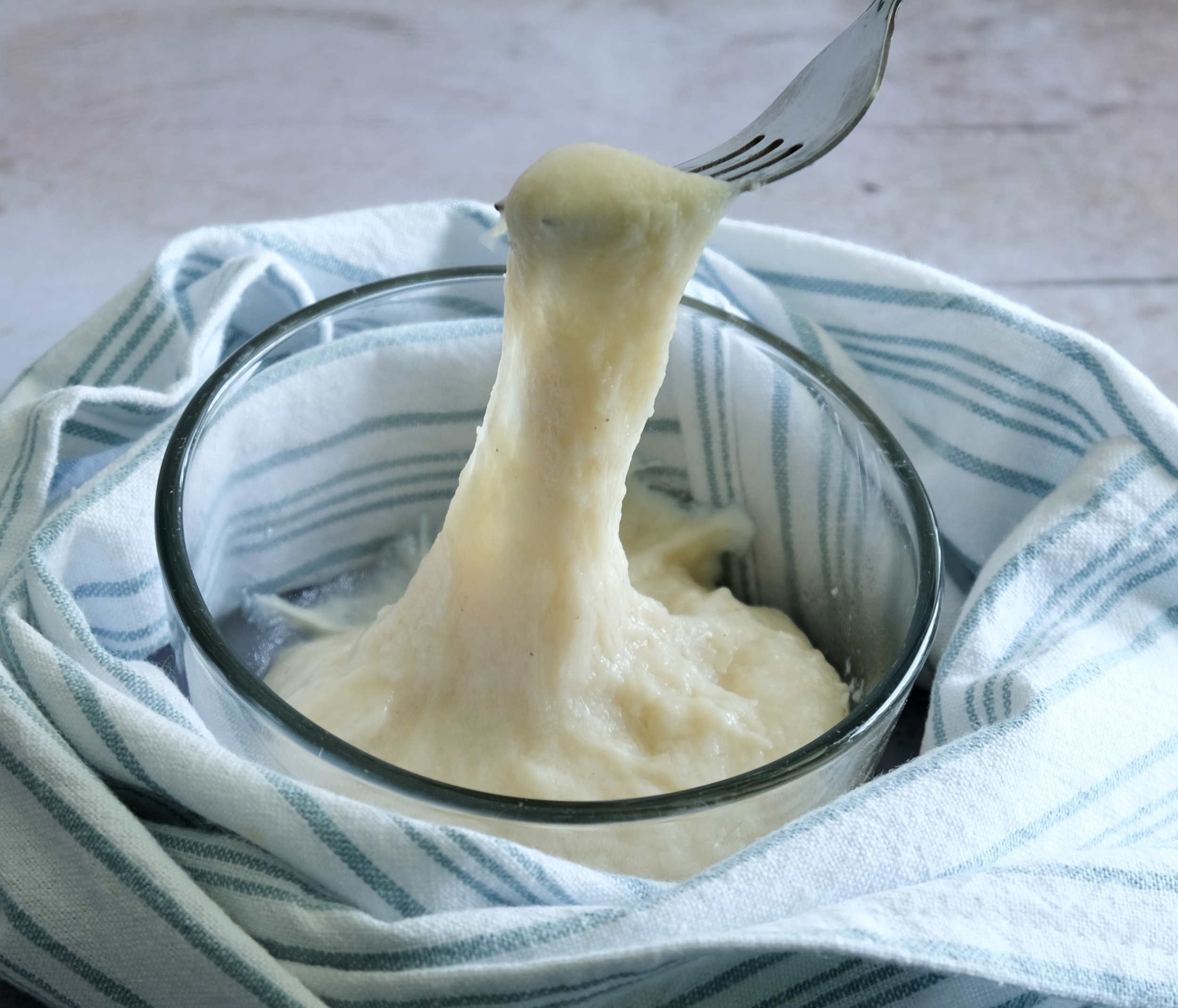 stretchy vegan mozzarella in bowl