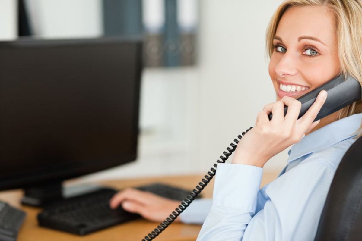 Smiling woman talking on phone
