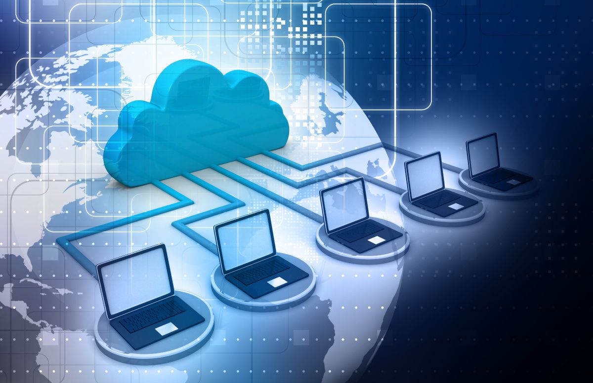 Five laptops connected with digital cloud