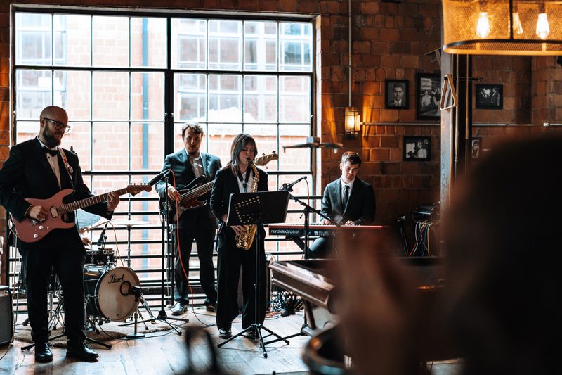 JJ Band on stage at an event