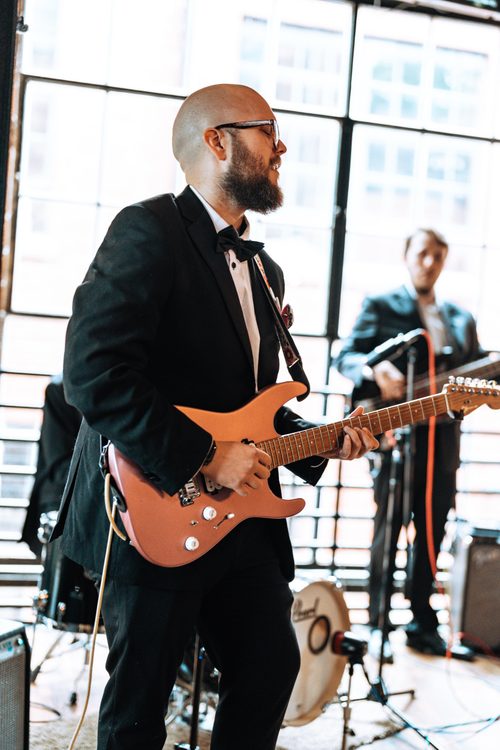 JJ Band performing at a festival