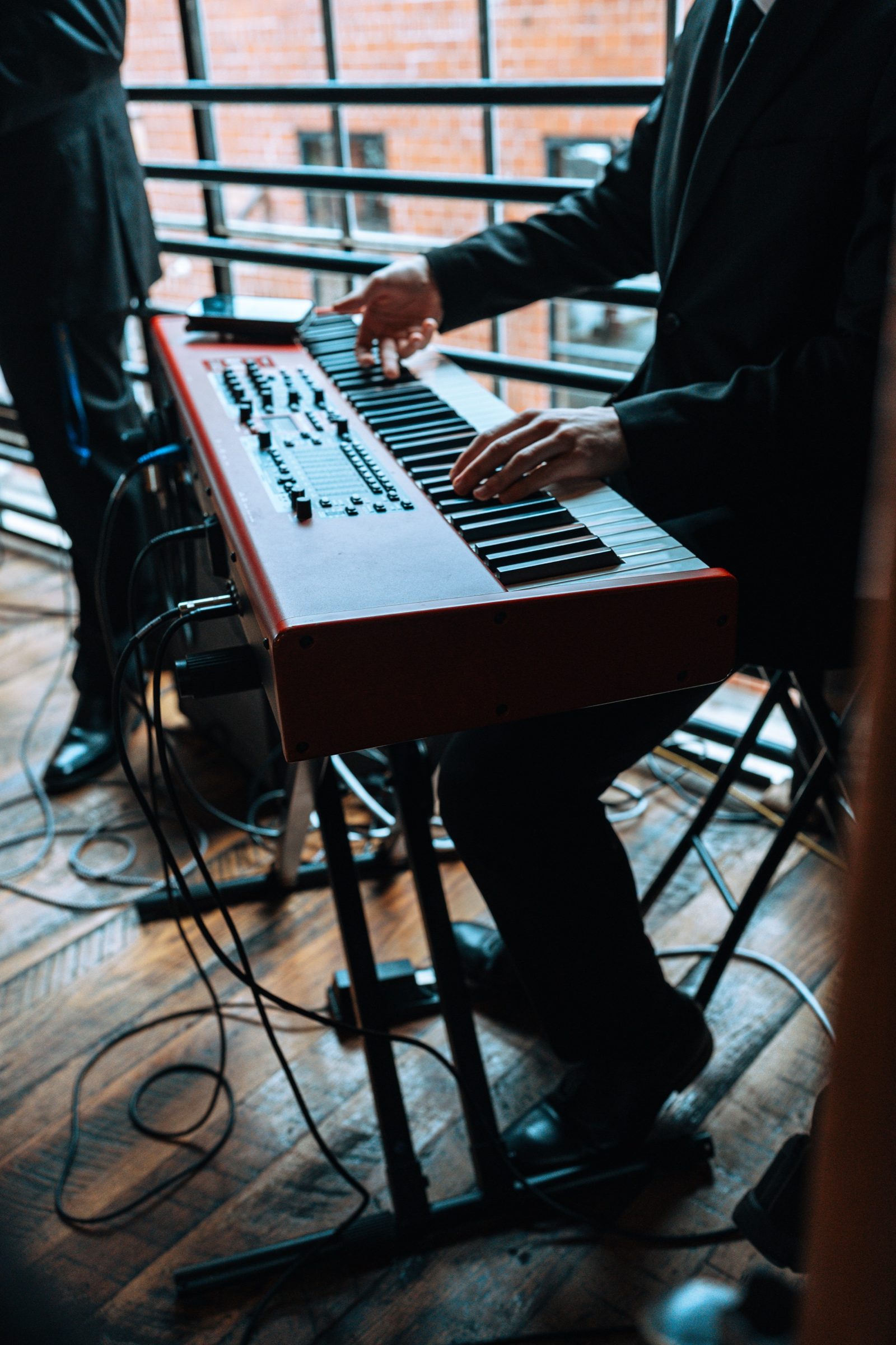 Pianist playing at a JJ Band performance