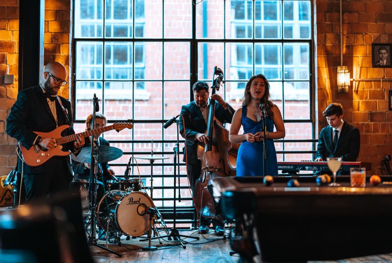 JJ Band performing live for guests