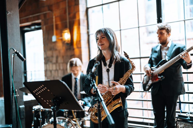 Saxophonist and band performing live