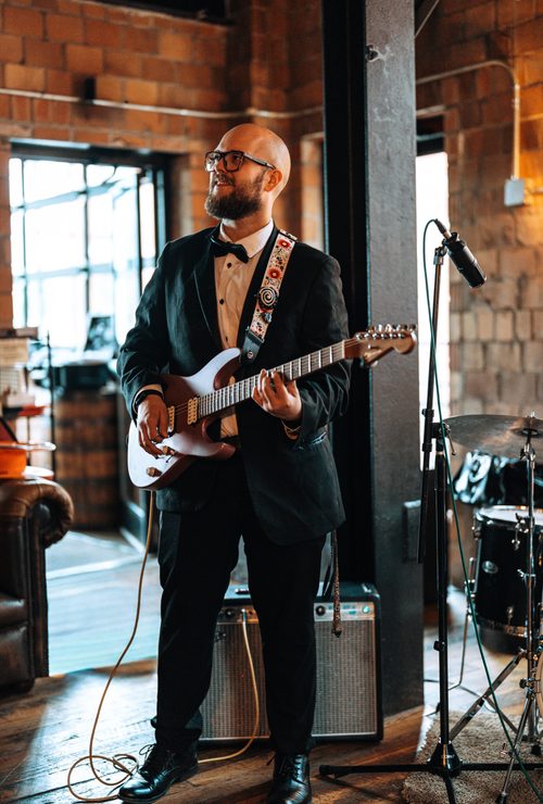 JJ Band guitarist at a formal