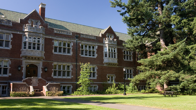 A university campus with traditional landscaping