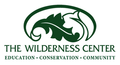The Wilderness Center logo with words Education Conservation Community