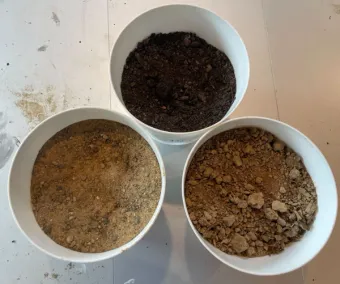 The three primary soil types, sand, loam and clay.