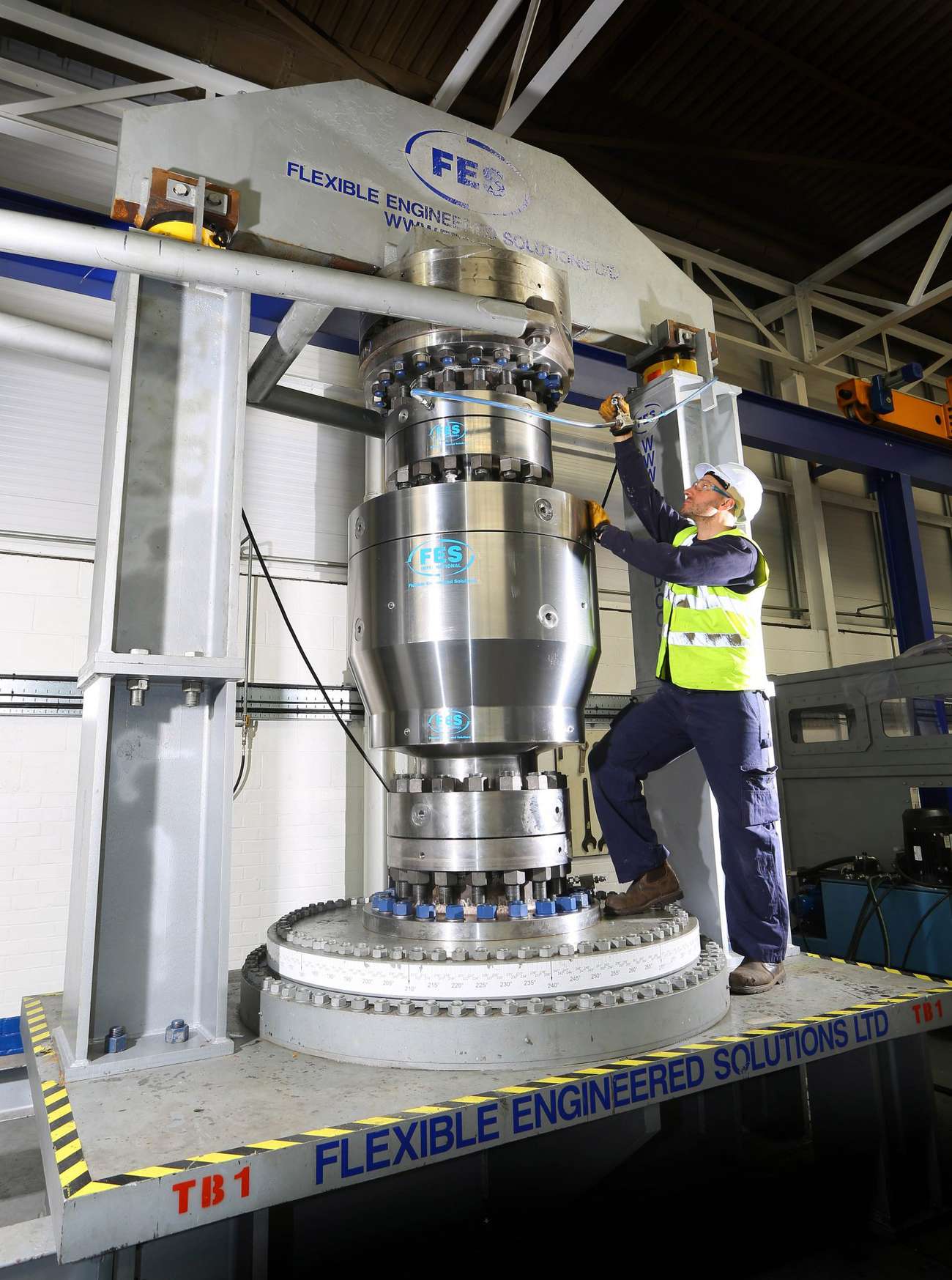 A man checking a piece of subsea equipment