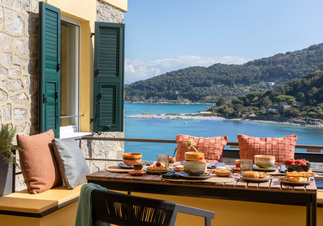 Breakfast table on the private terrace overlooking the Gulf of Portovenere and Palmaria Island