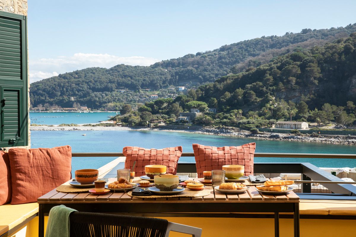 Breakfast on the terrace with a view over the sea and the Church of San Pietro