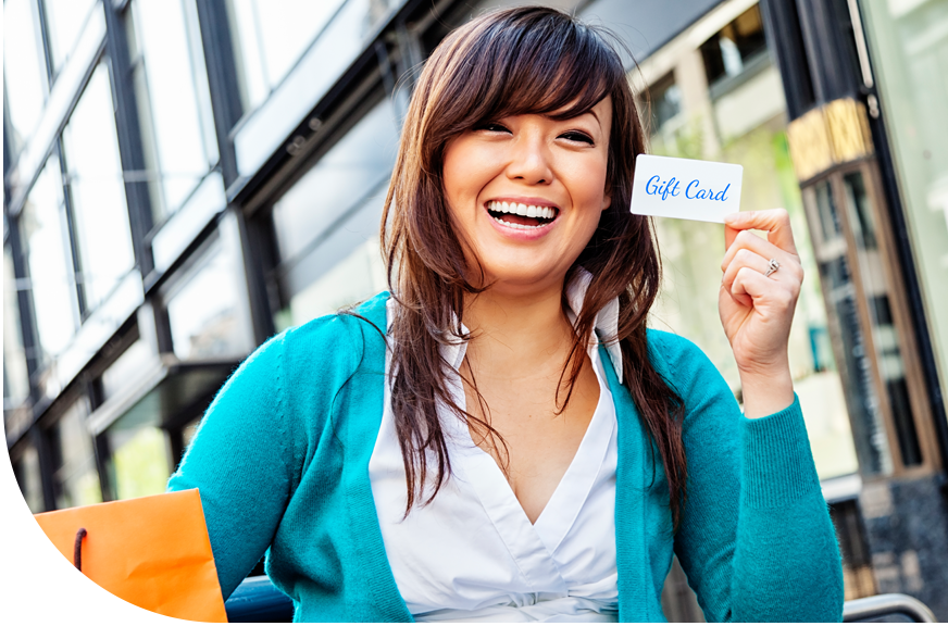 gift card program_woman smiling holding gift card