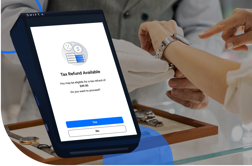 A luxury retail shop with a payment device in the foreground showing tax free shopping prompt on a payment terminal - Shift4