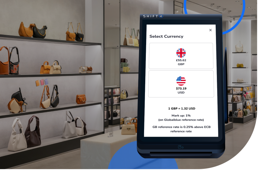 A luxury retail shop with Dynamic currency conversion shown on a payment device in the foreground - Shift4