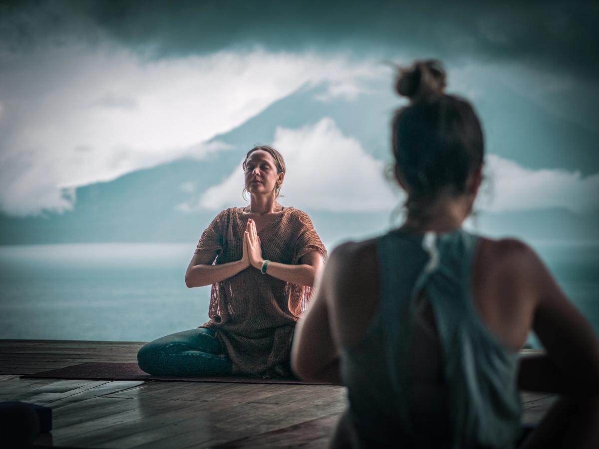Yoga teacher Namaste mudra