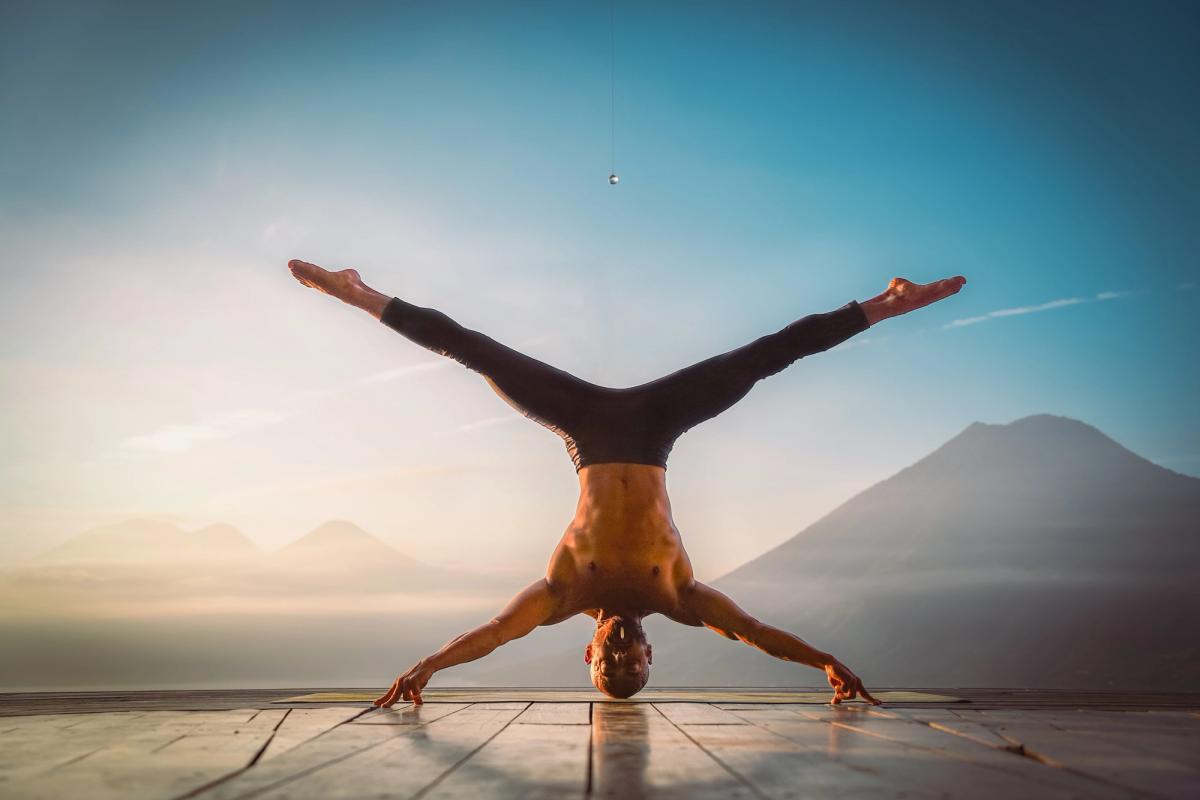 Power of Yoga - advanced headstand pose