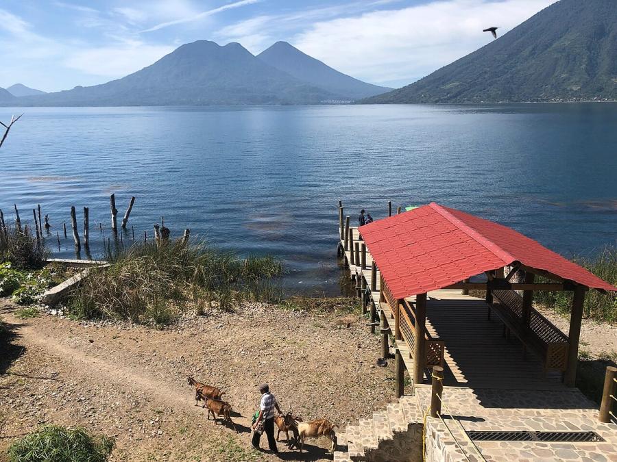 The public boat dock at San Marcos La Laguna on Lake Atitlan, with two volcanoes across the water