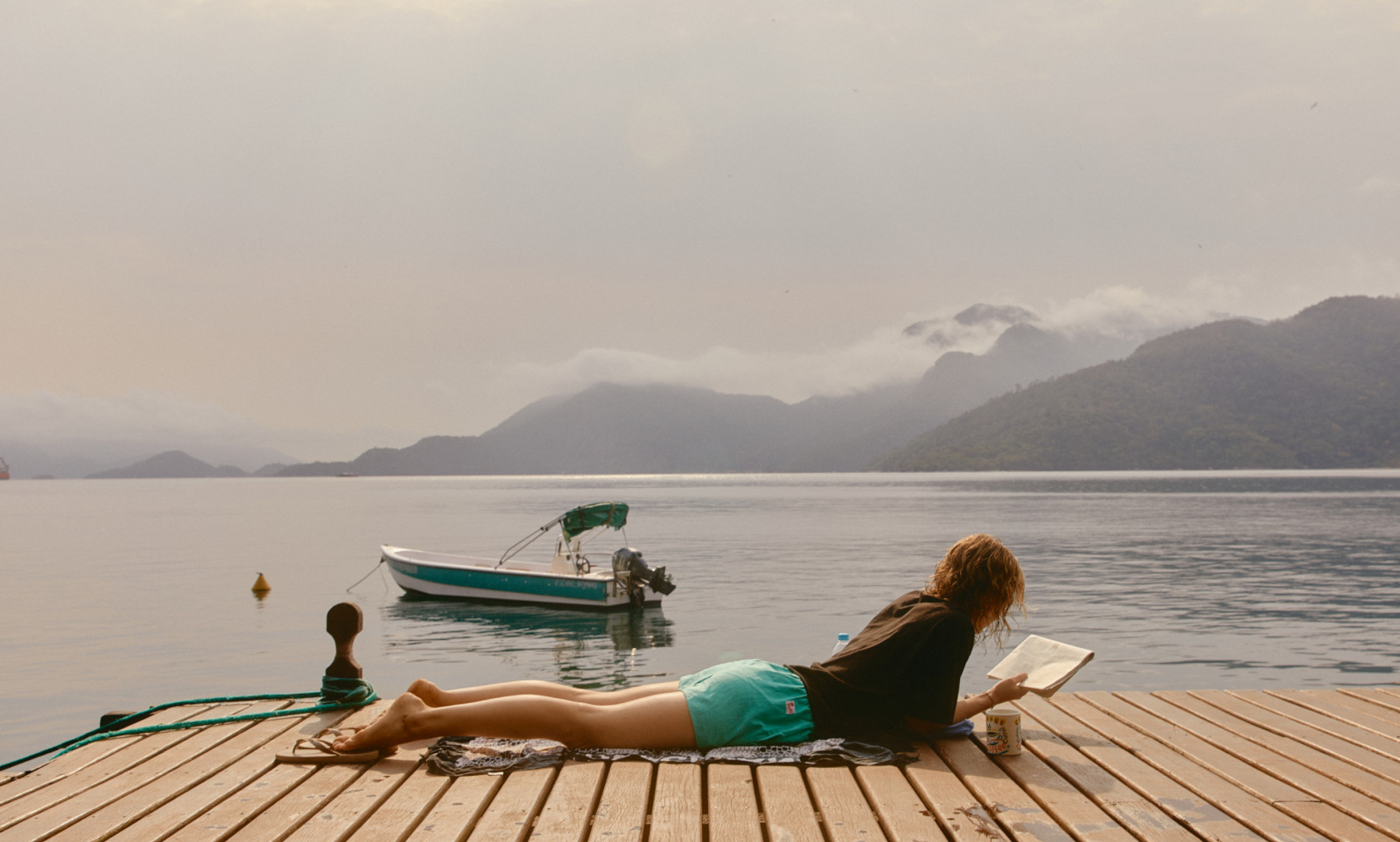 Women who is reading a book at the beach