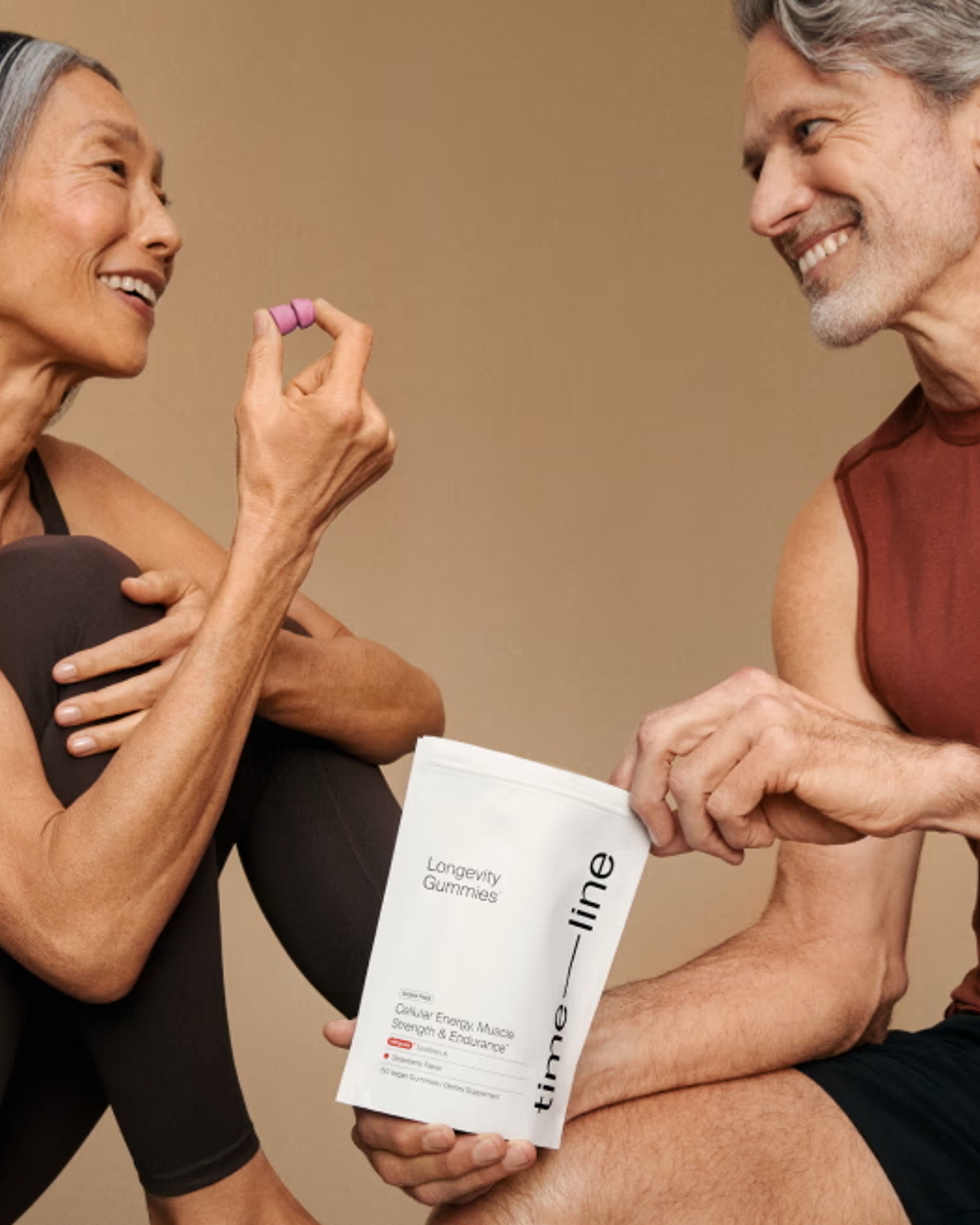 Woman and man trying Urolithin A Mitopure Gummies