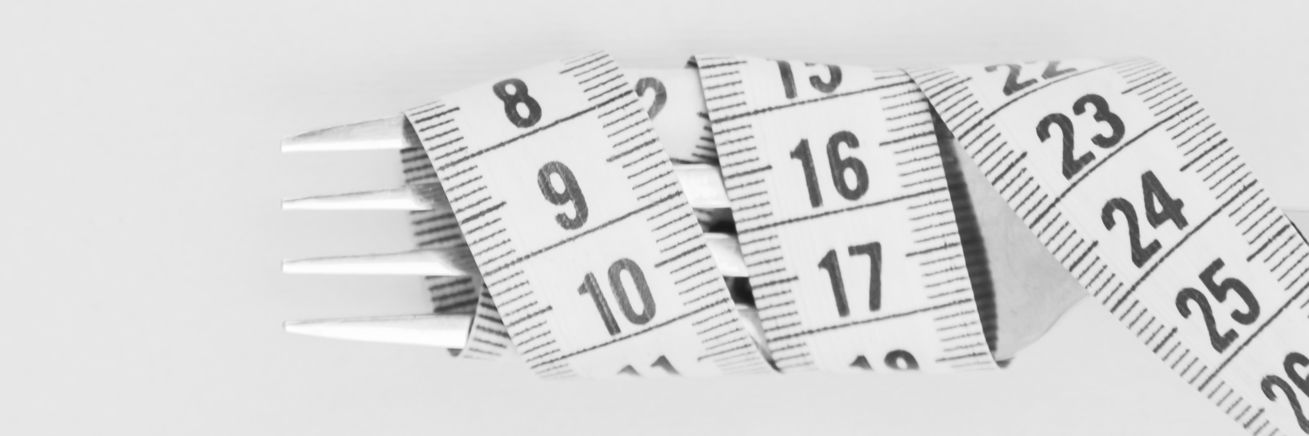 Tape measure wrapped around fork