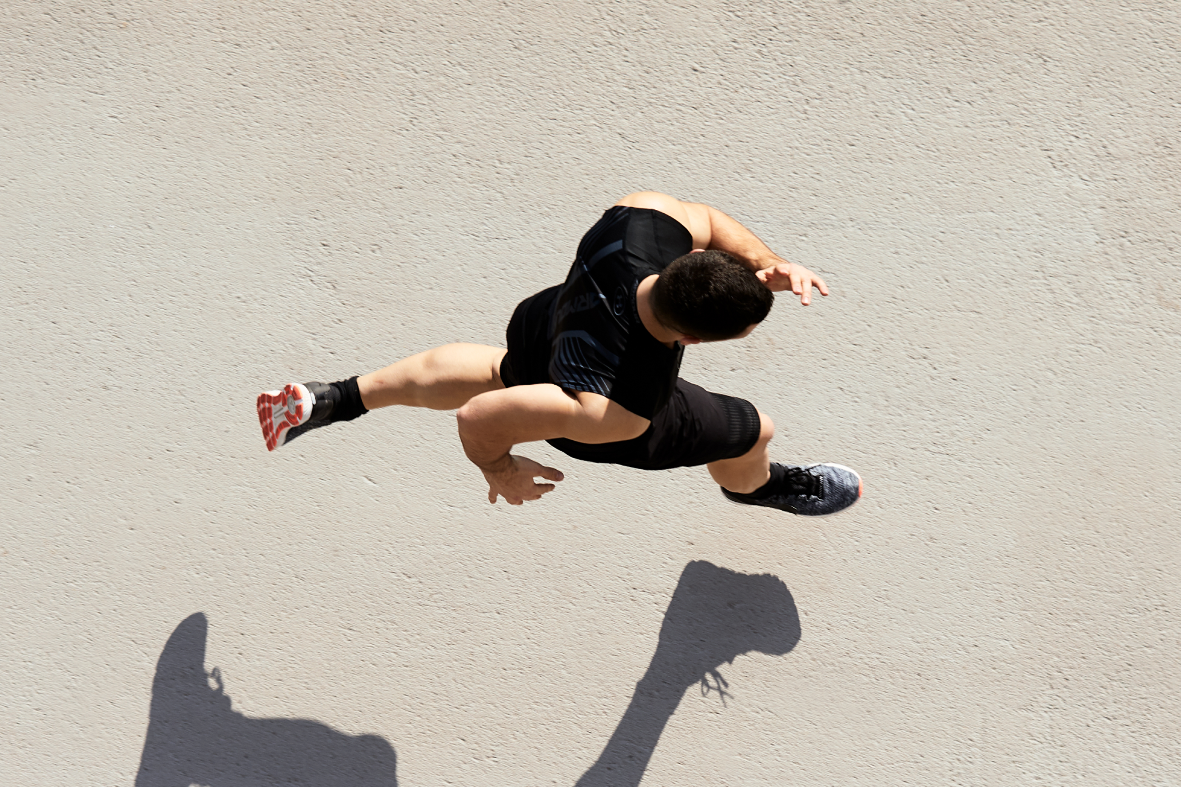 Men running seen from above