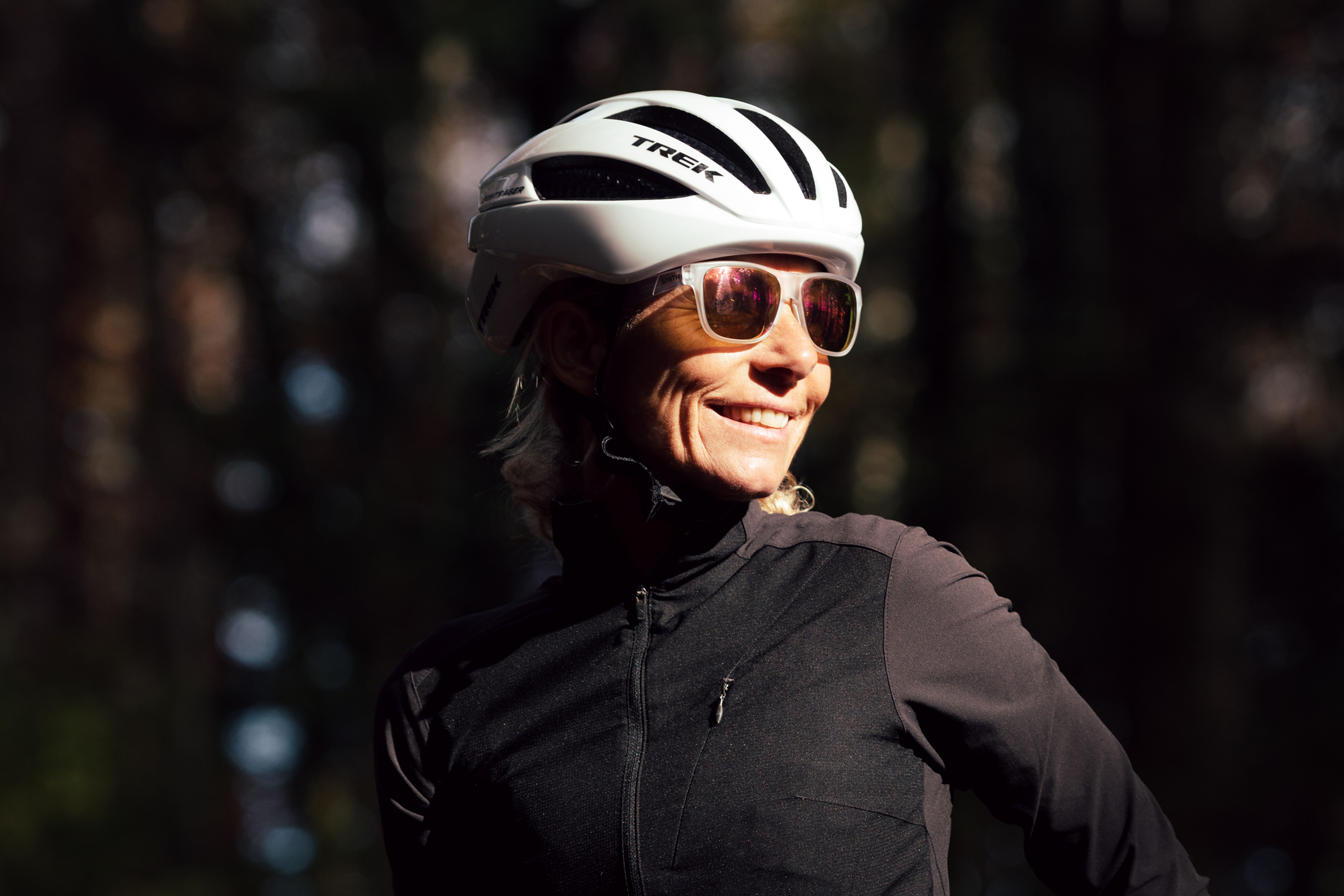 Outdoors portrait of a female cyclist smiling 