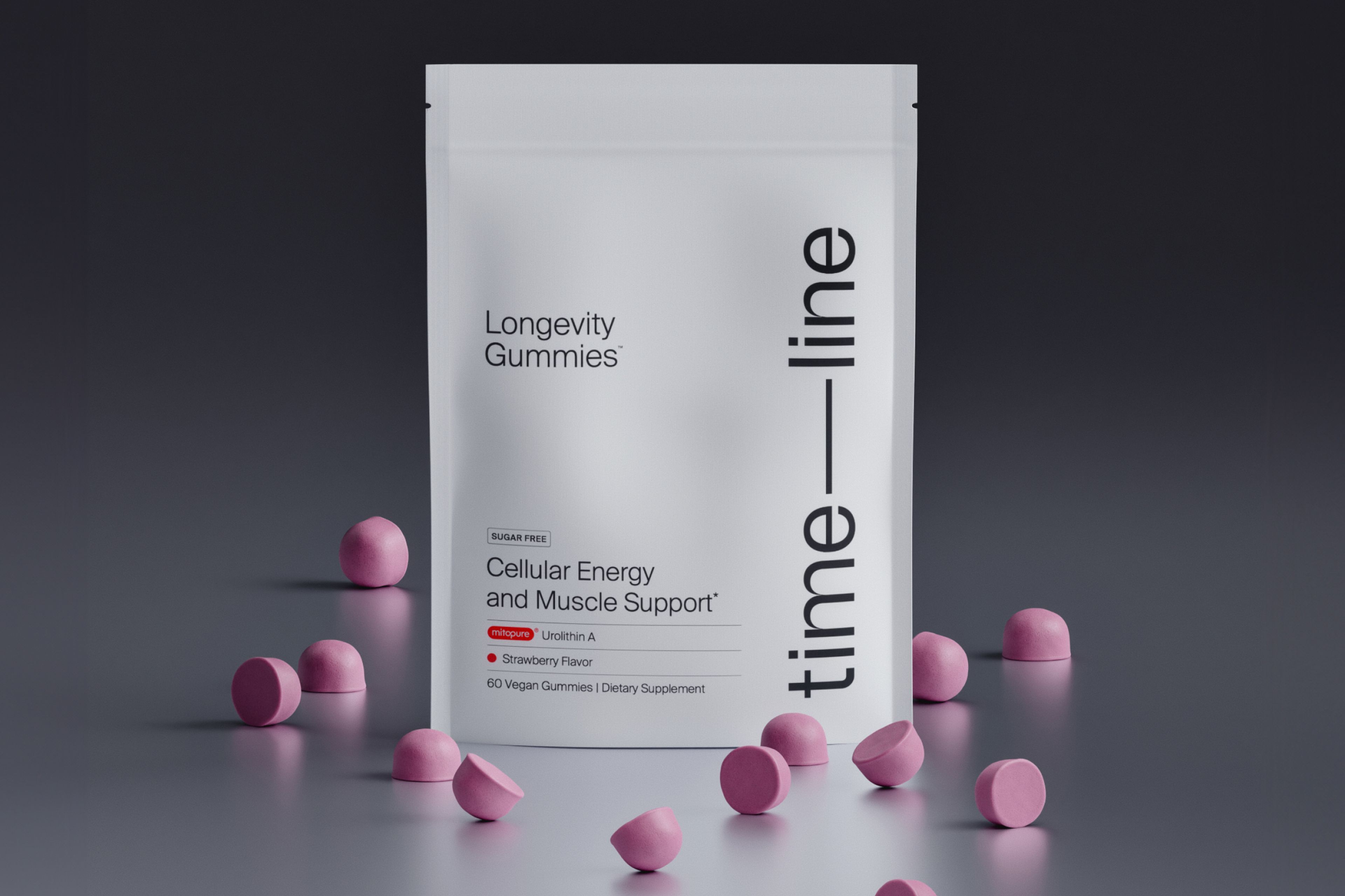 bag of Urolithin A Gummies with gummies spread around it