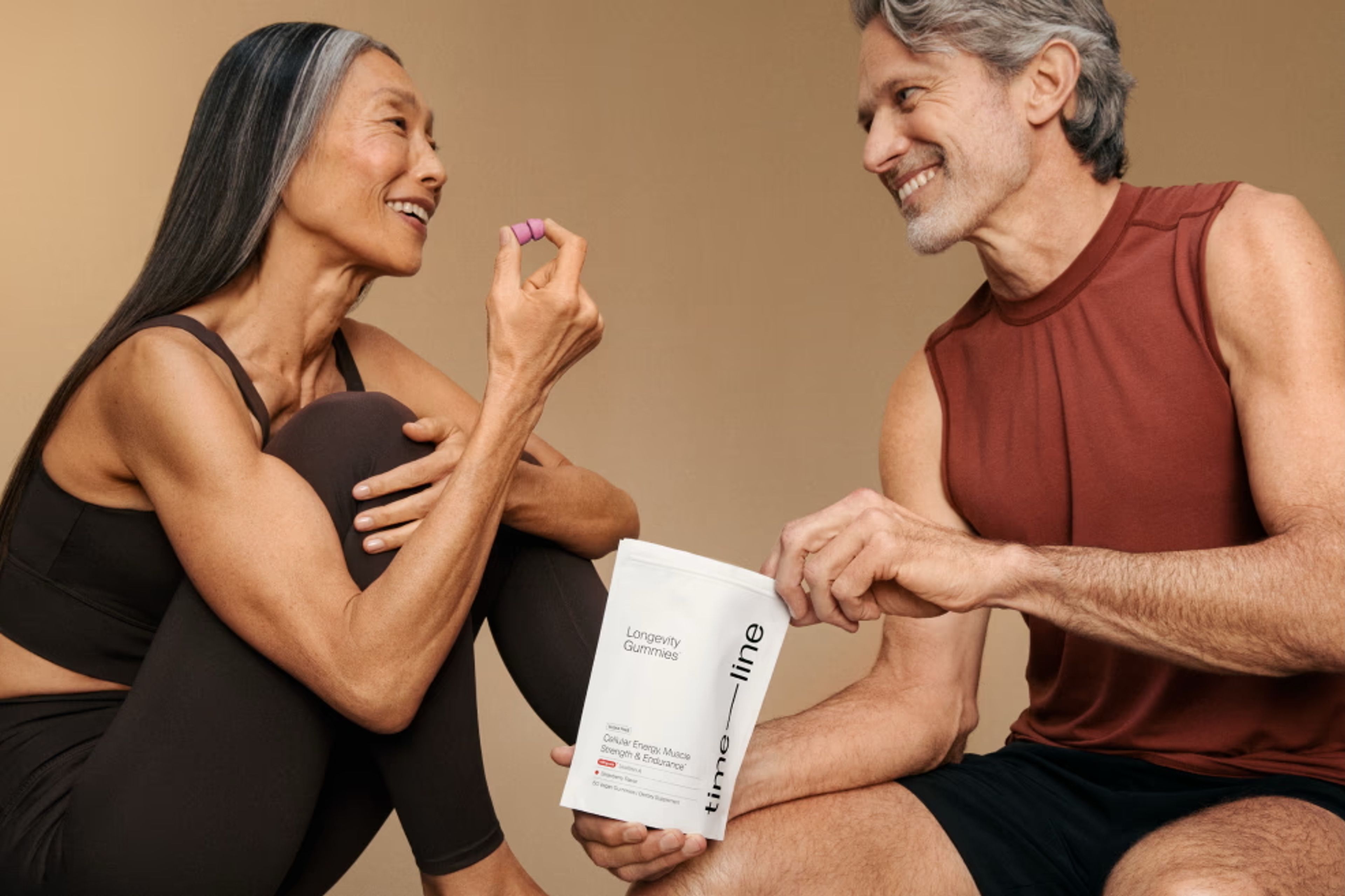 Woman and man trying Urolithin A Mitopure Gummies