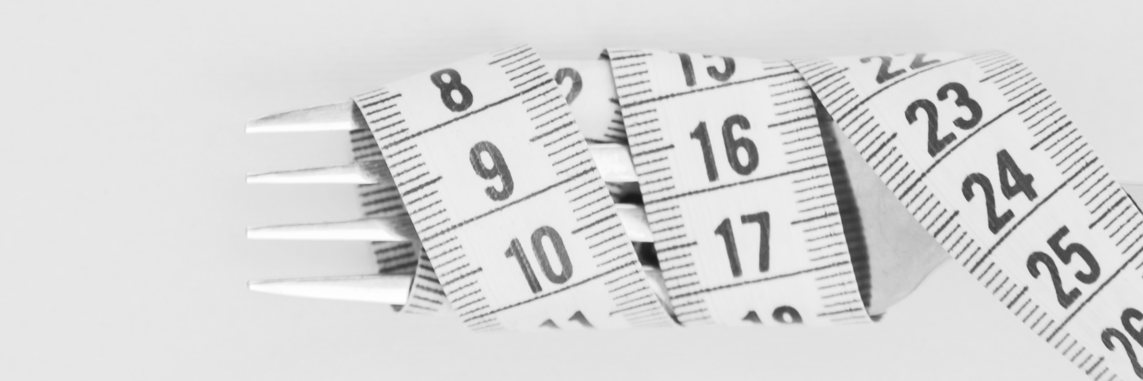 Tape measure wrapped around fork