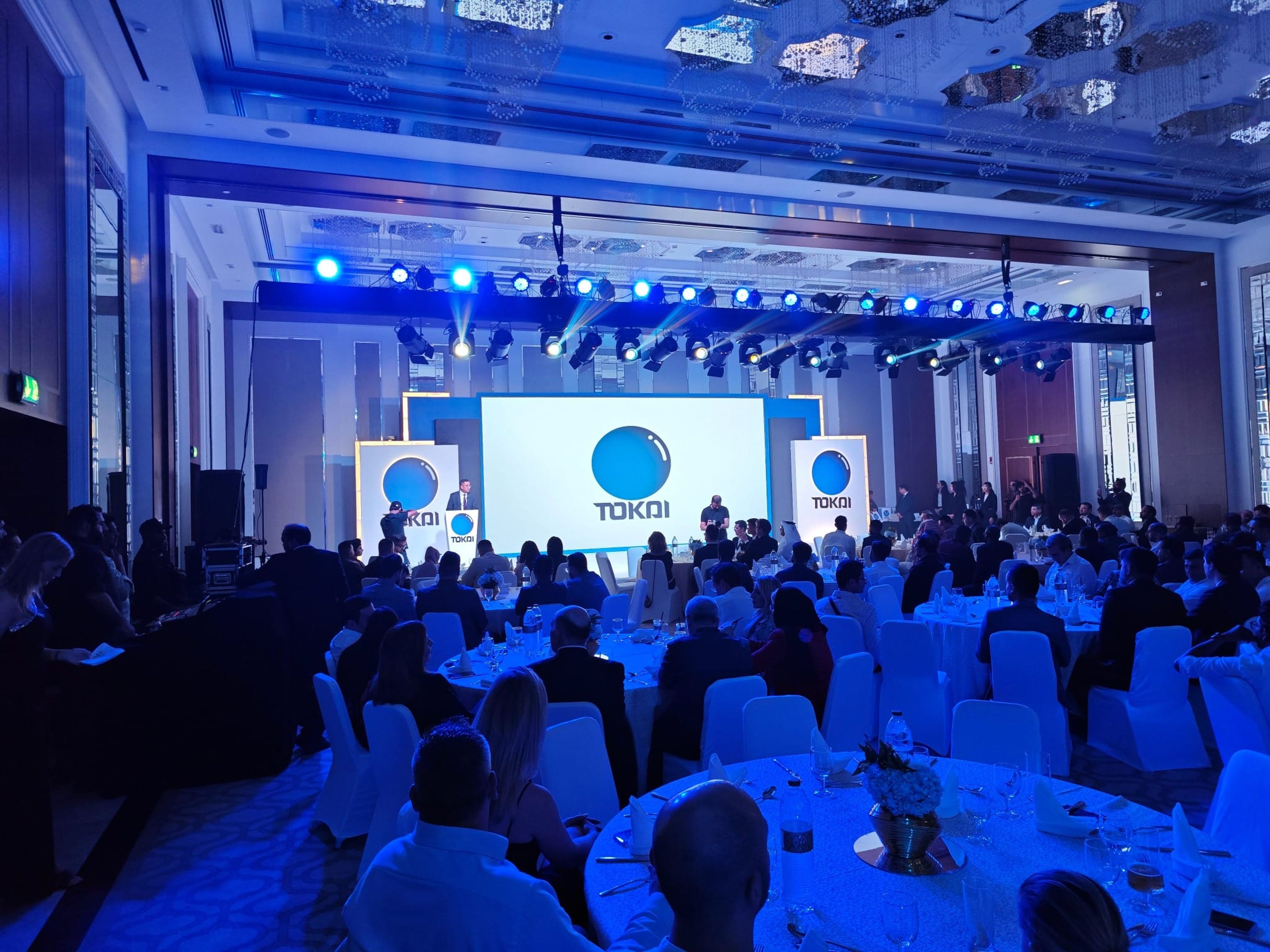 Tokai Optical gala awards night with guests at round tables facing the branded stage at Taj Business Bay, Dubai