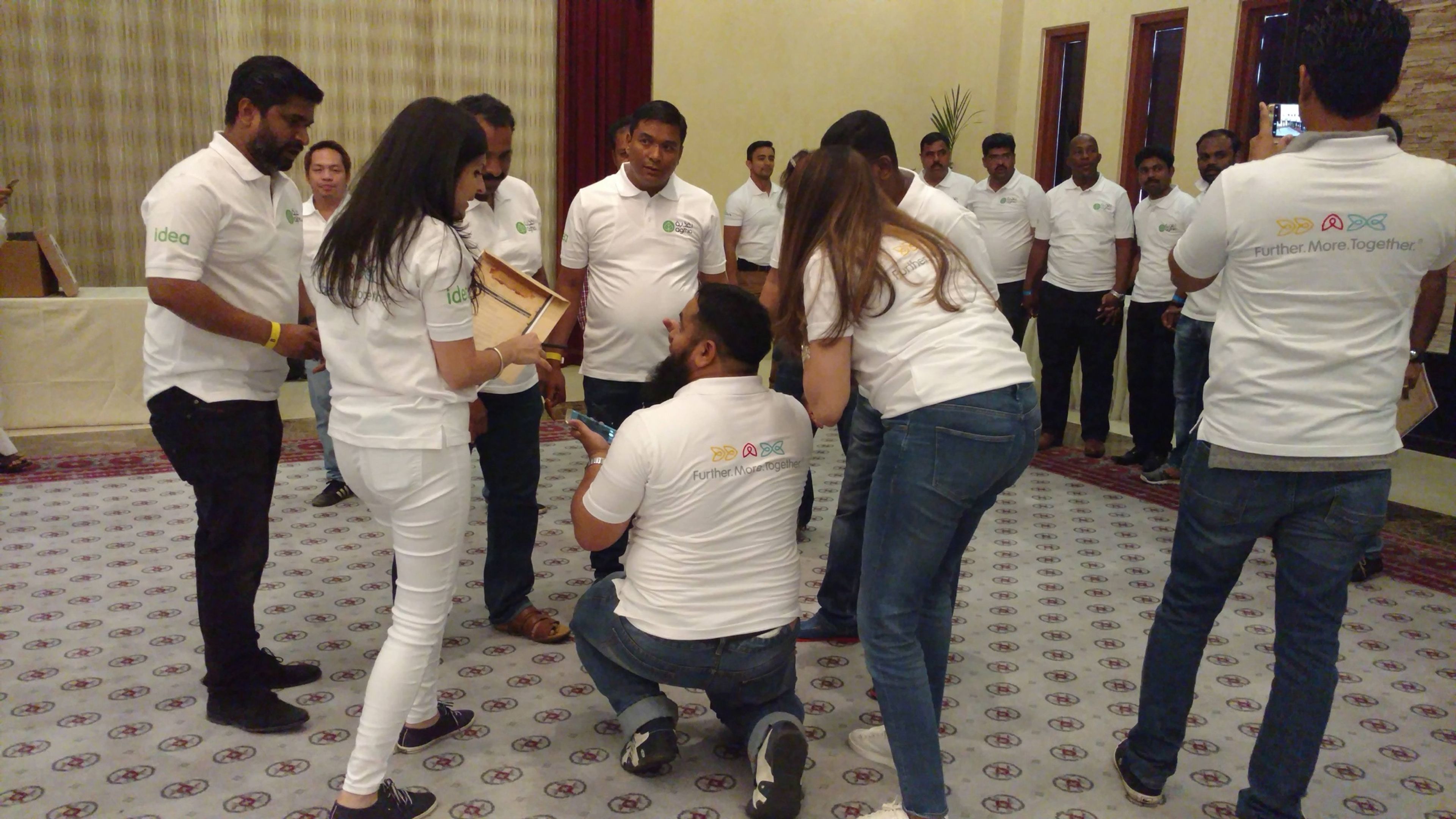 Team members taking part in a playful team-building game