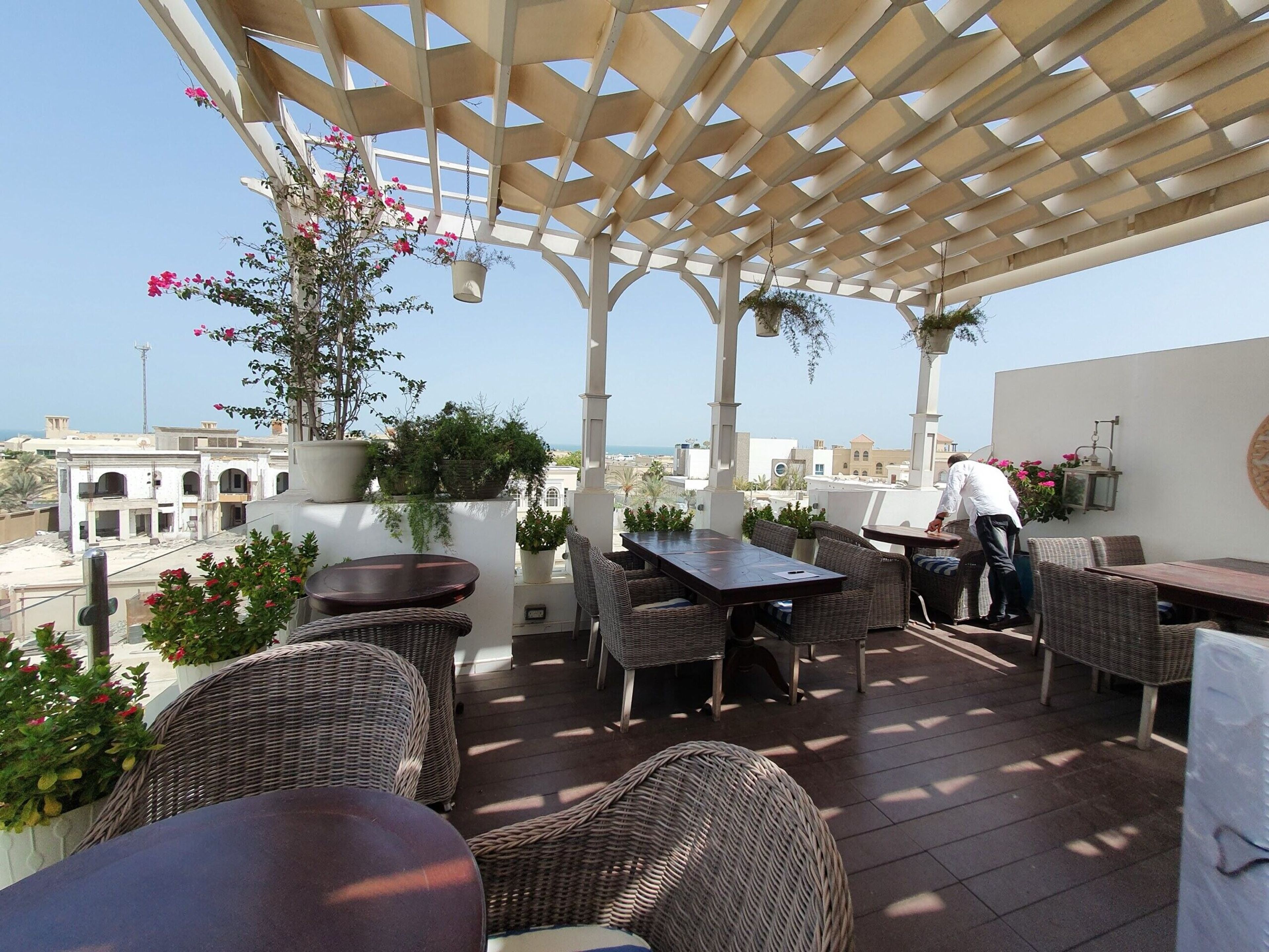 Rooftop terrace with pergola and lounge furniture for a private event