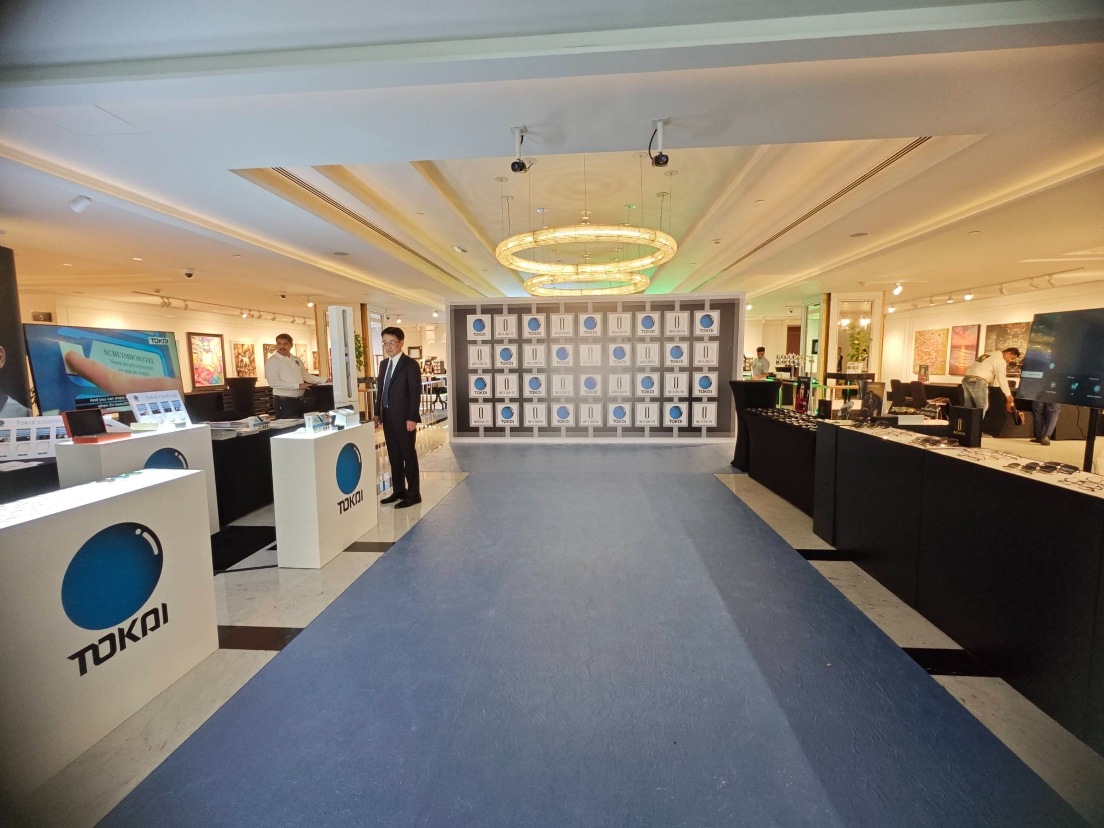 Tokai product exhibition walkway with branded plinths and photo wall