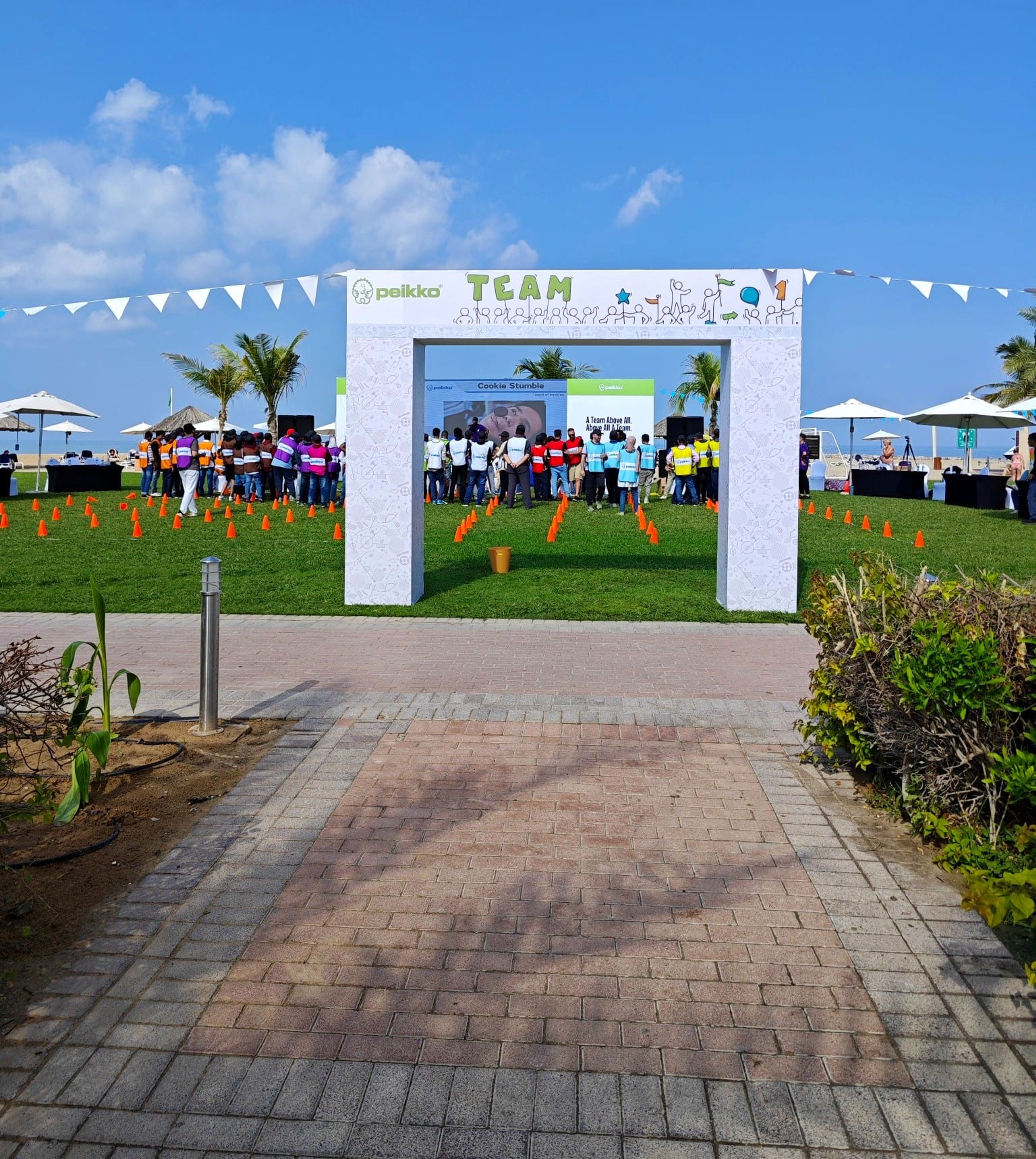 Team building entrance arch on the beach lawn at Hilton Ras Al Khaimah