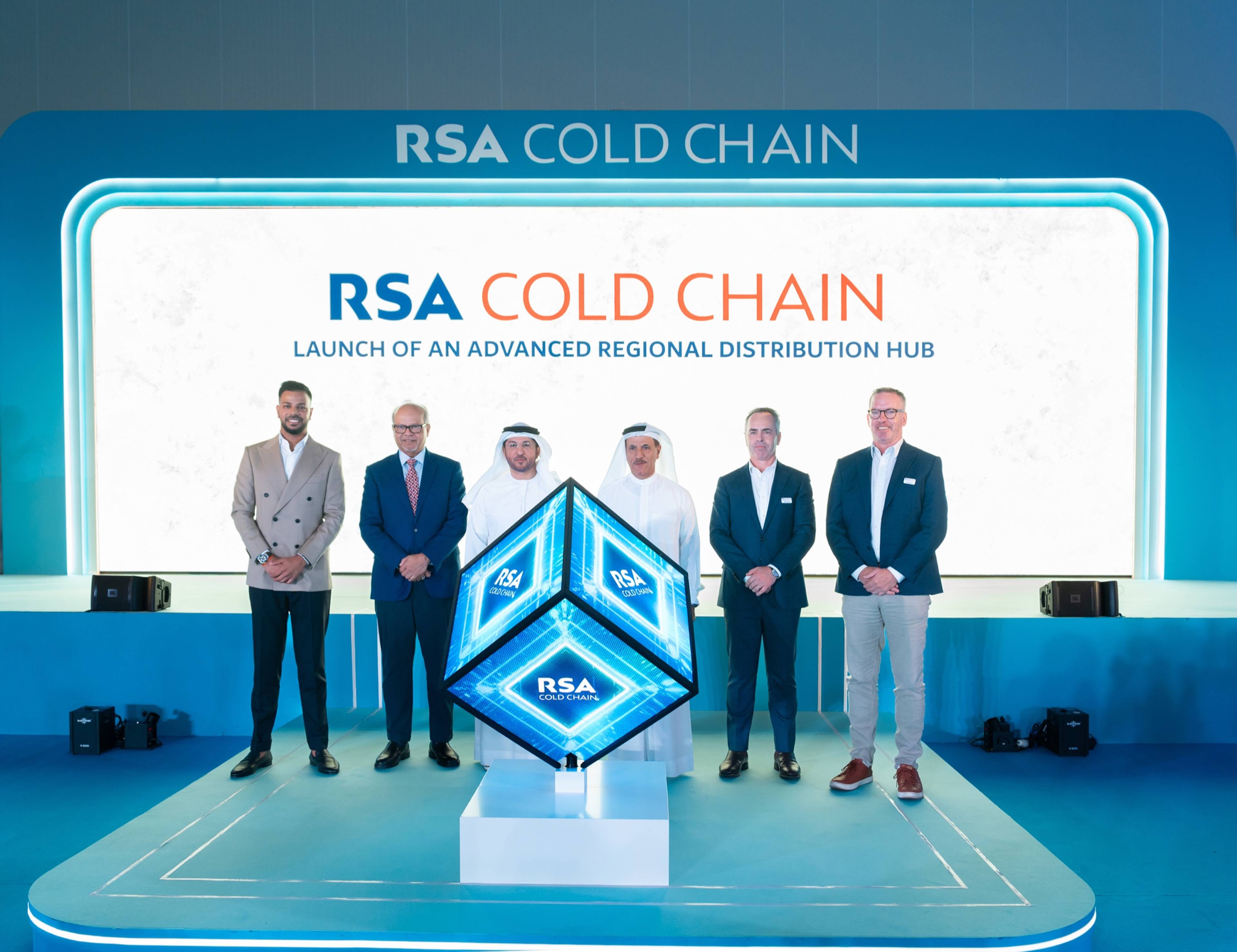 Product launch stage with an LED backdrop and executives at a branded reveal