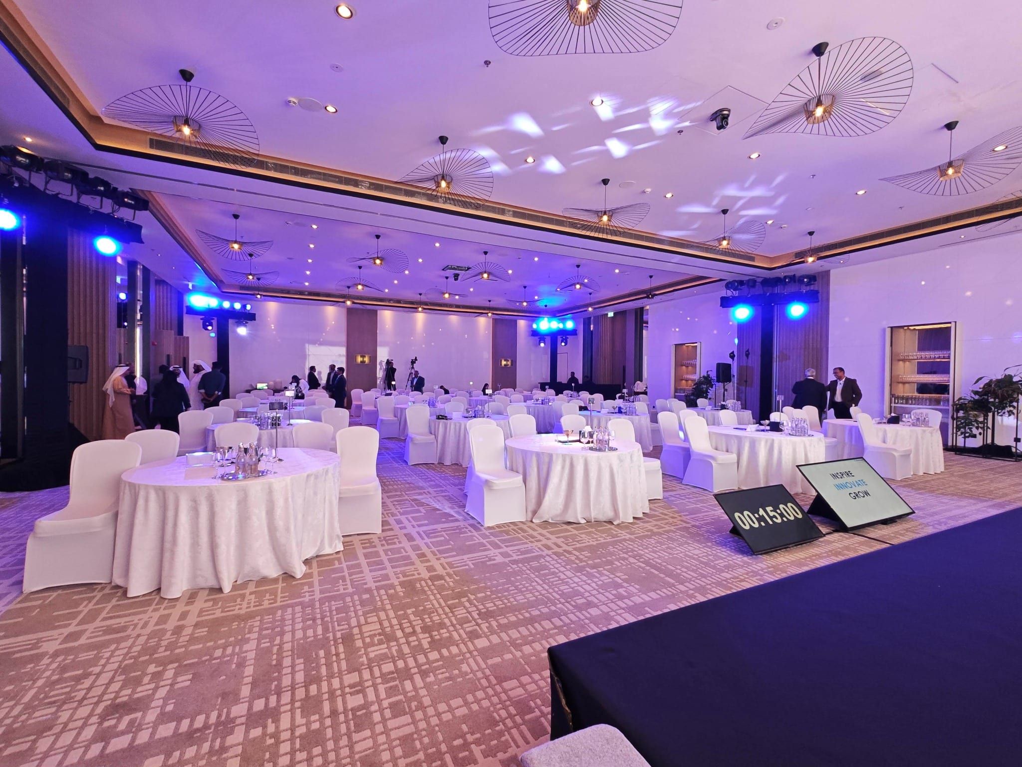 Ballroom layout with round tables, stage edge and confidence monitor at Le Meridien JBR
