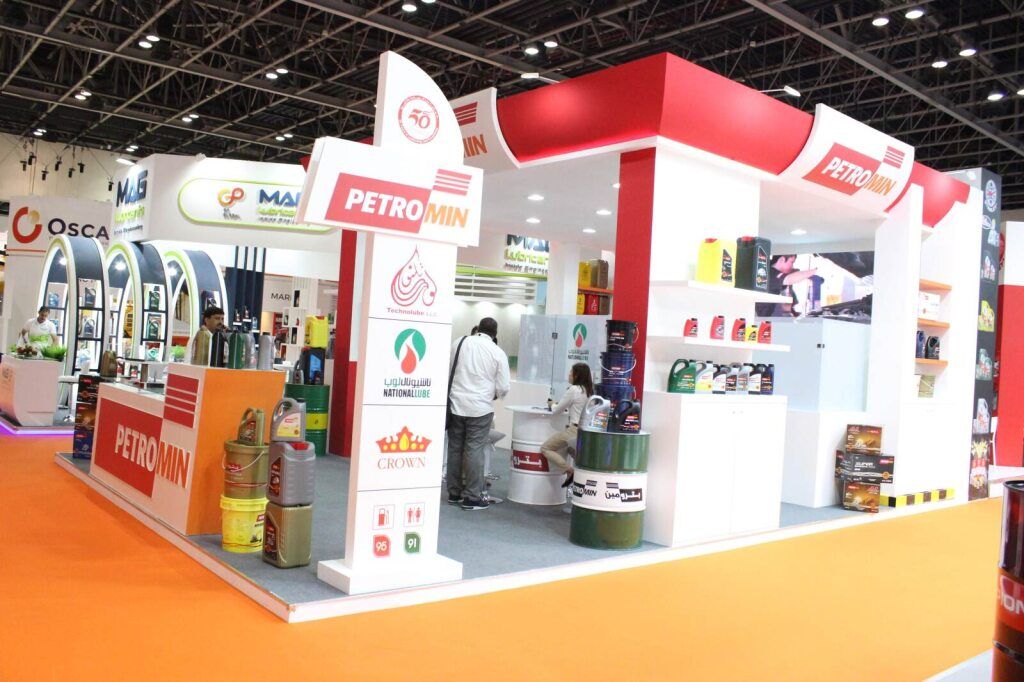 Colourful branded exhibition stand with product shelves