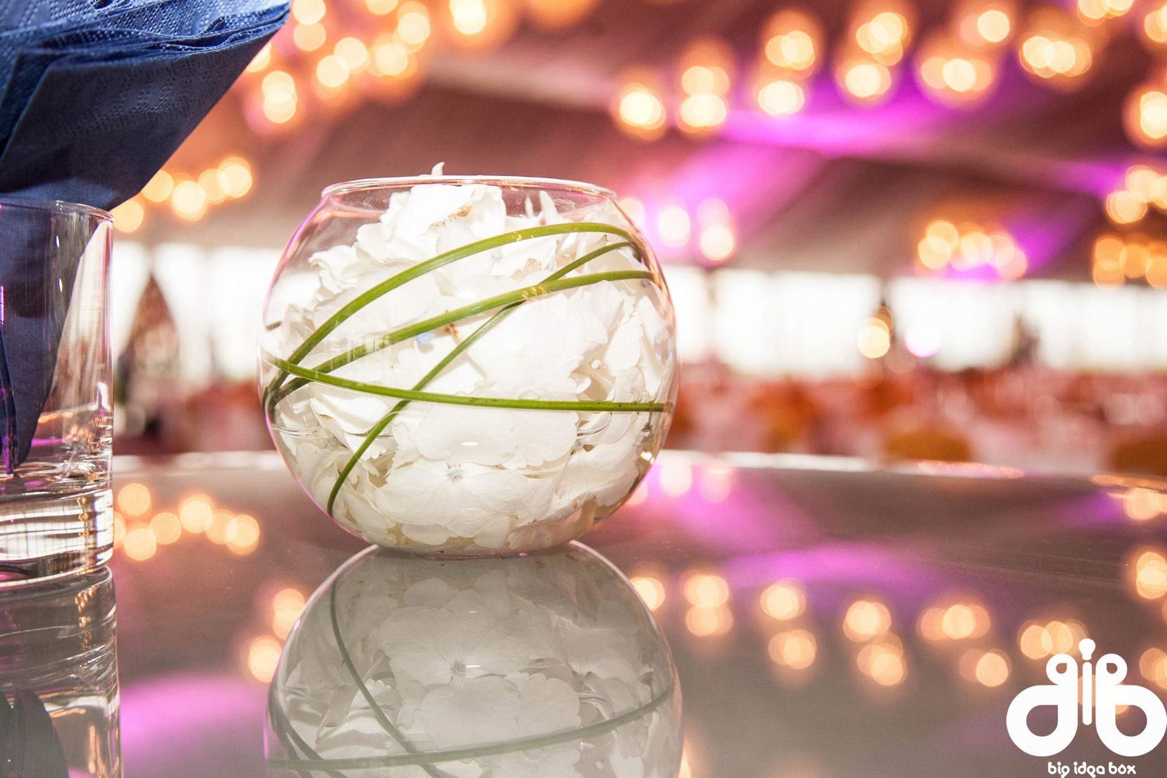 Glass bowl table centrepiece with soft purple lighting