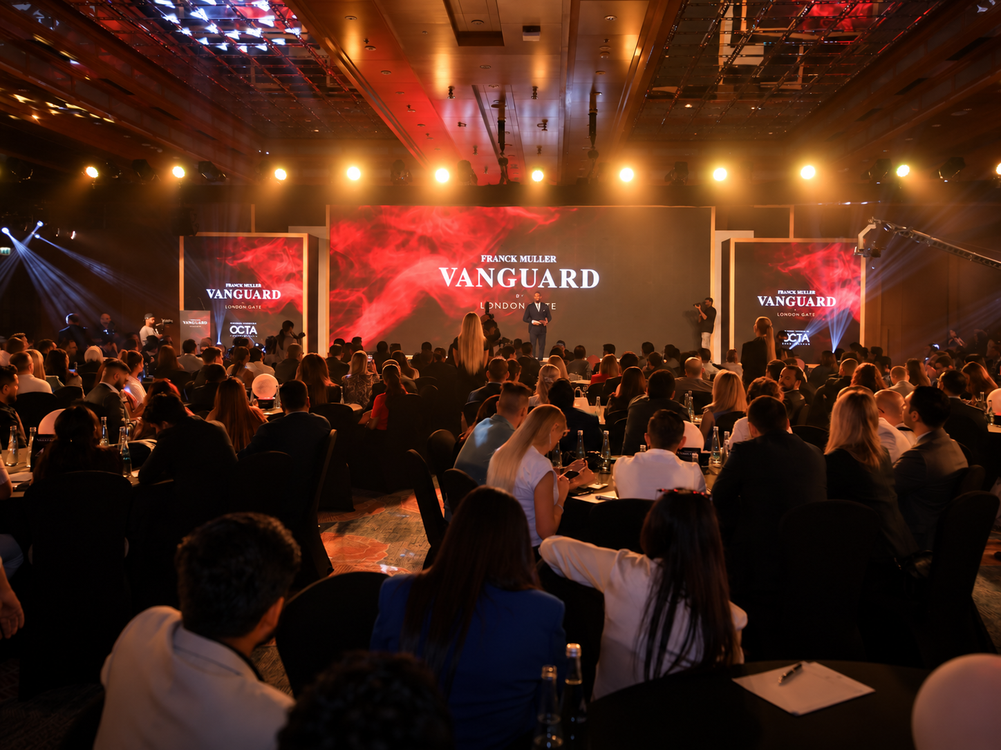 Full ballroom of guests facing the Franck Muller Vanguard launch stage and LED screens at the Ritz-Carlton DIFC, Dubai