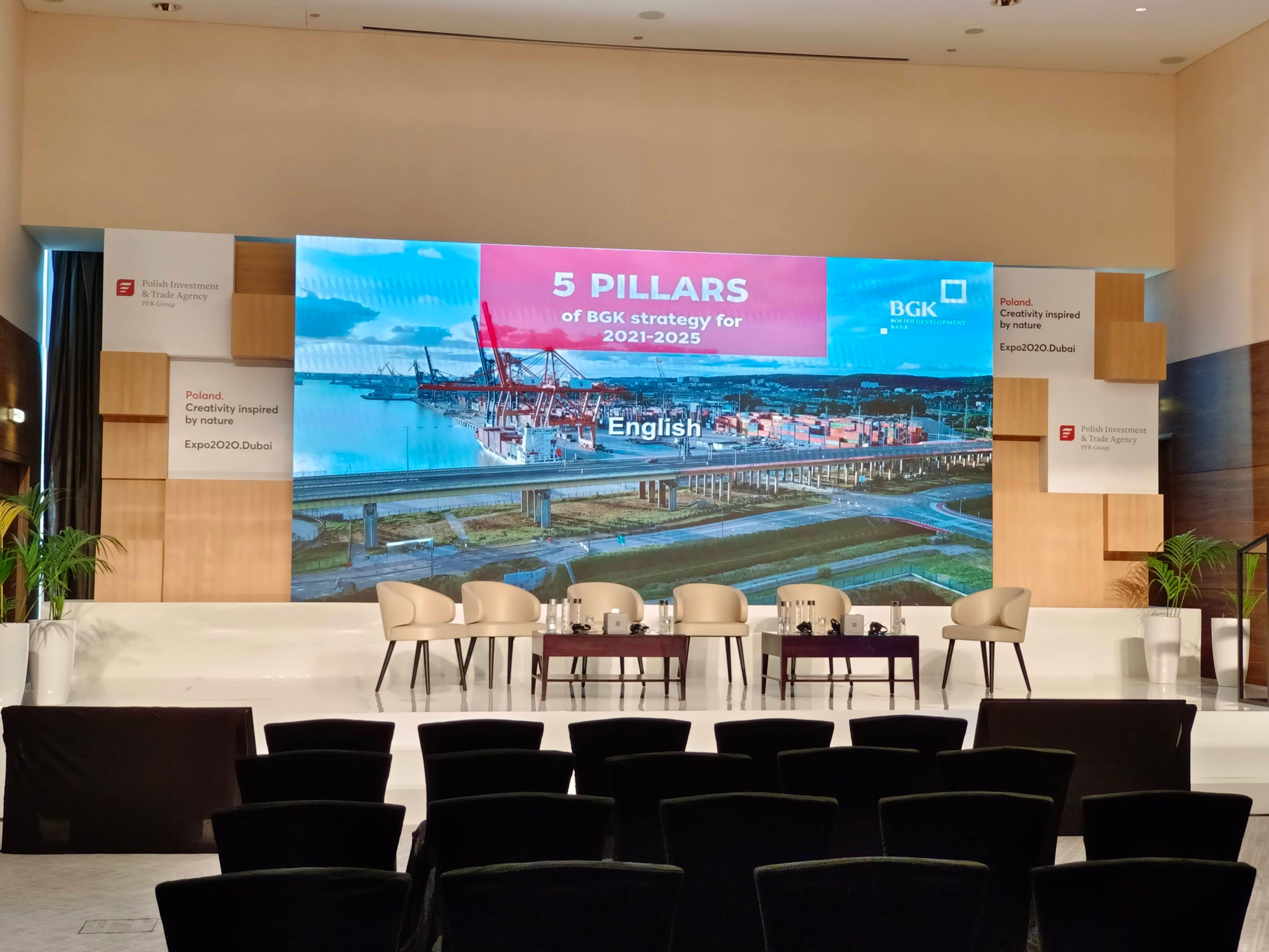 Polish African Conference stage with bold visuals and strategic lighting to support a strong, impactful speaker presence