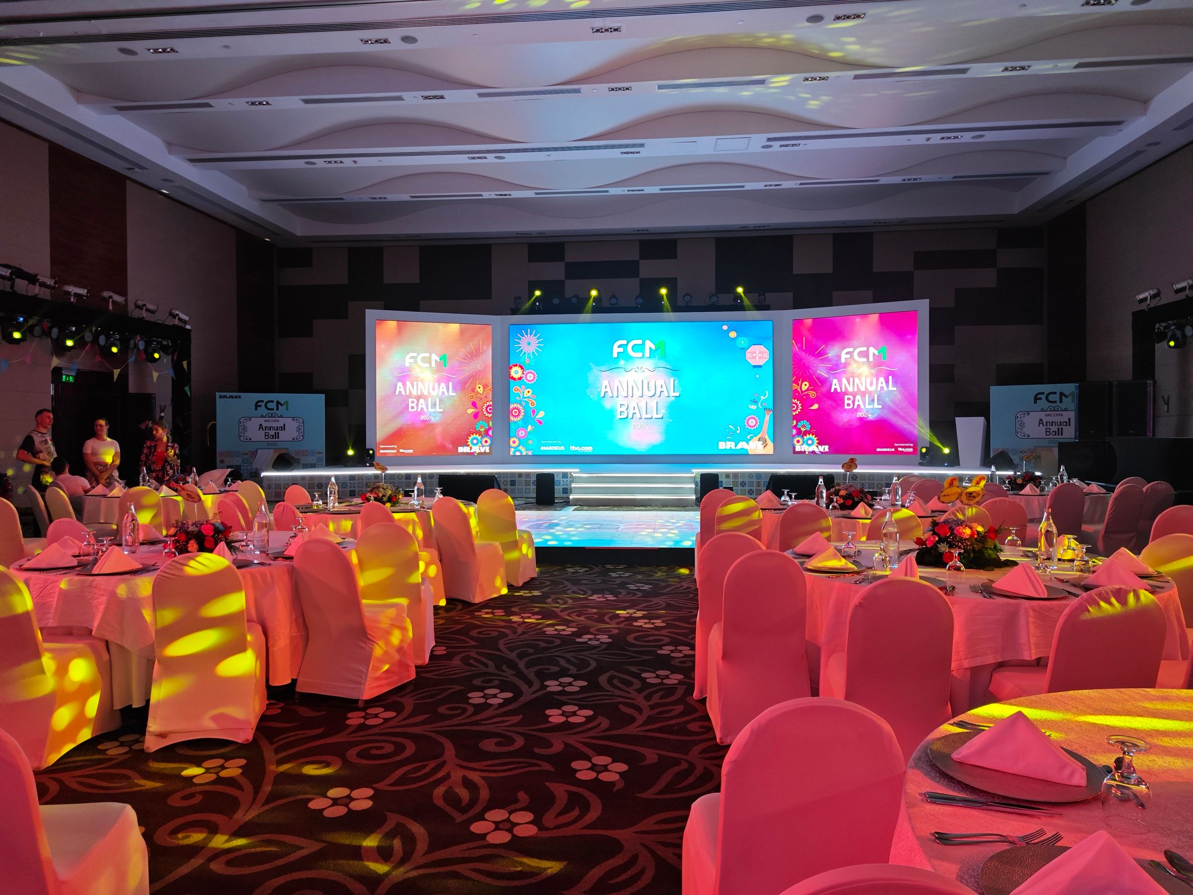 FCM Annual Ball stage setup showcasing sophisticated stage elements and interactive LED displays for a memorable event