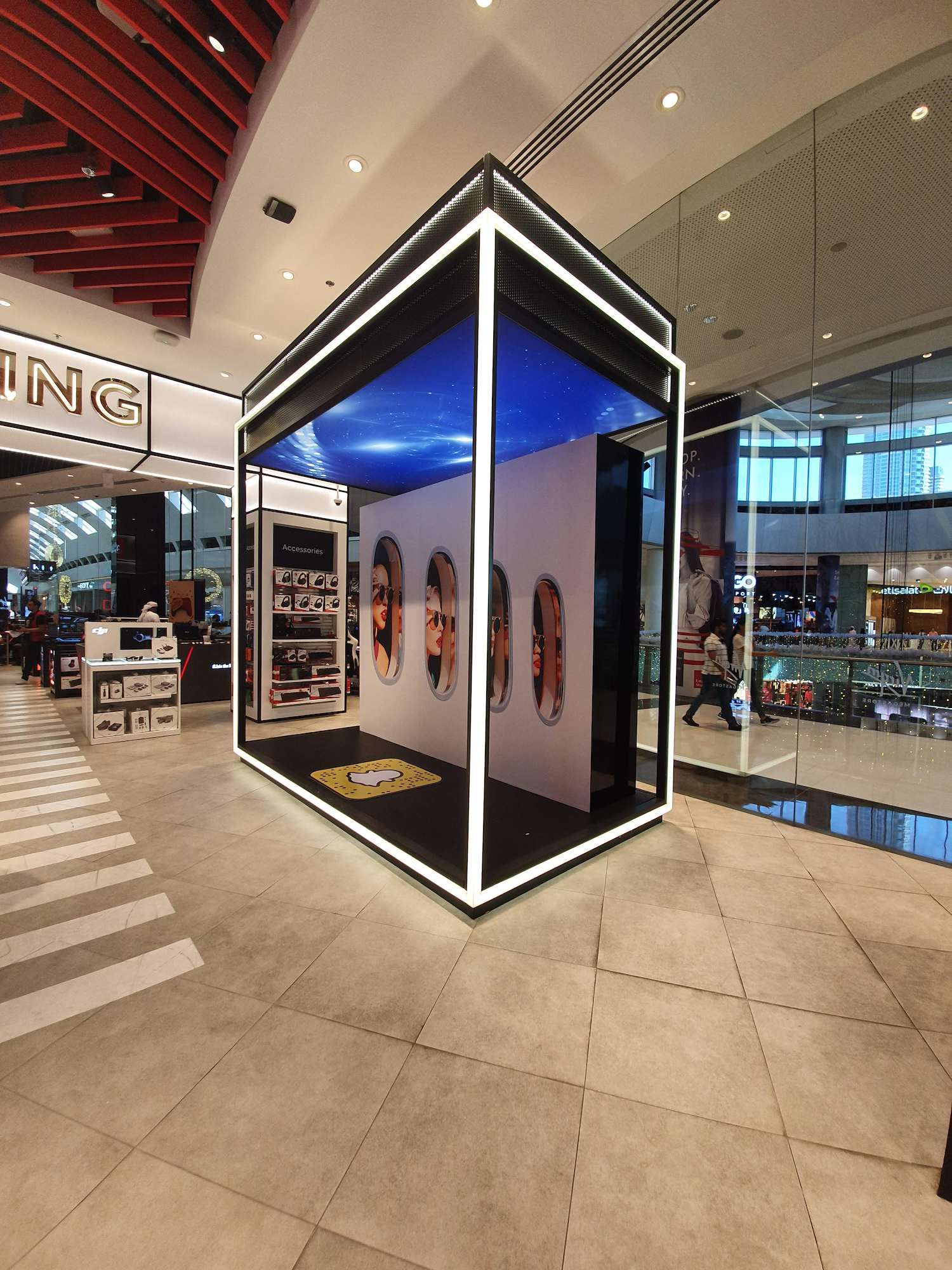 Free-standing illuminated booth for a product brand activation in a Dubai mall