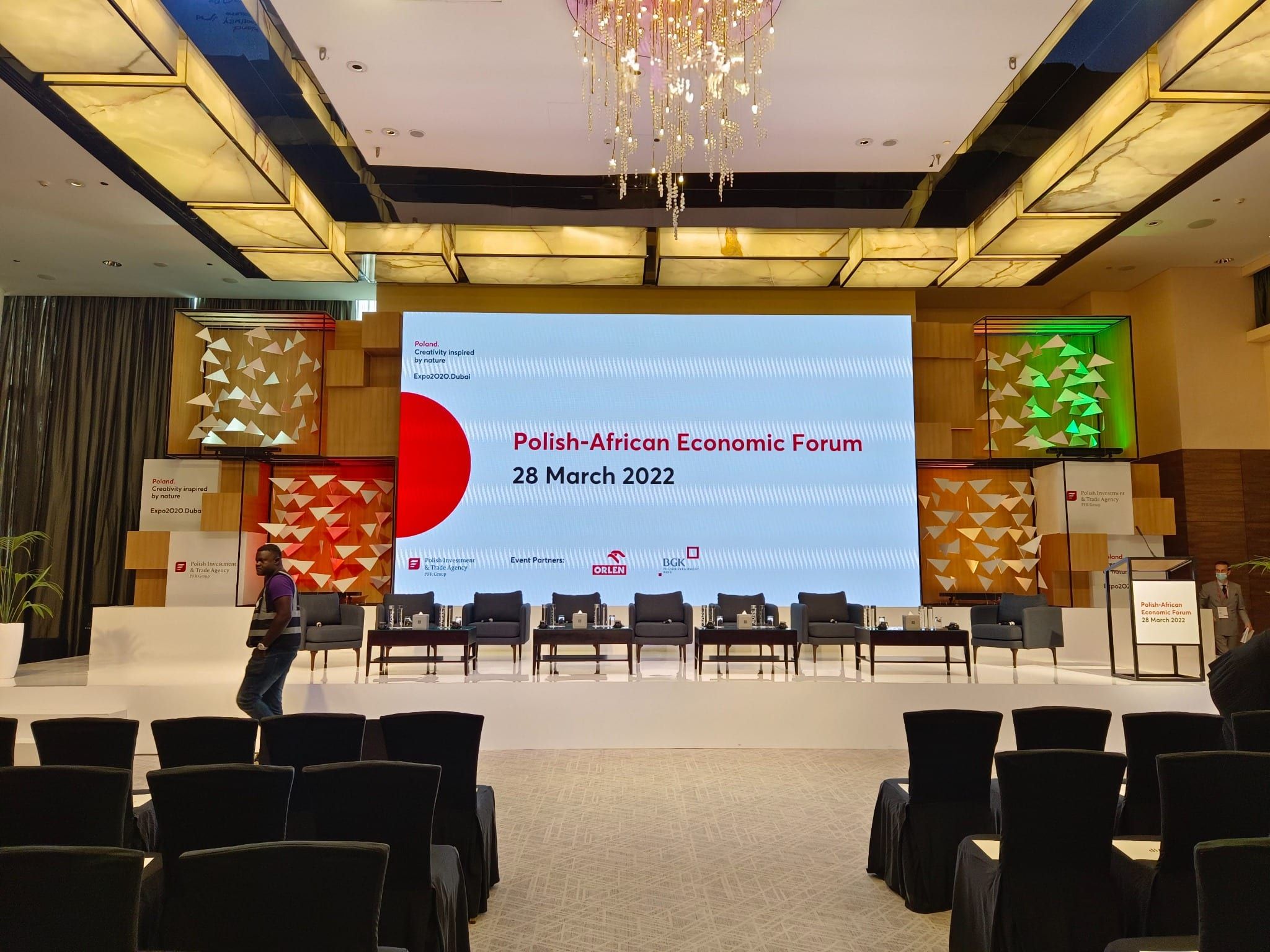 Conference hall with theatre seating and the Polish-African Economic Forum stage screen