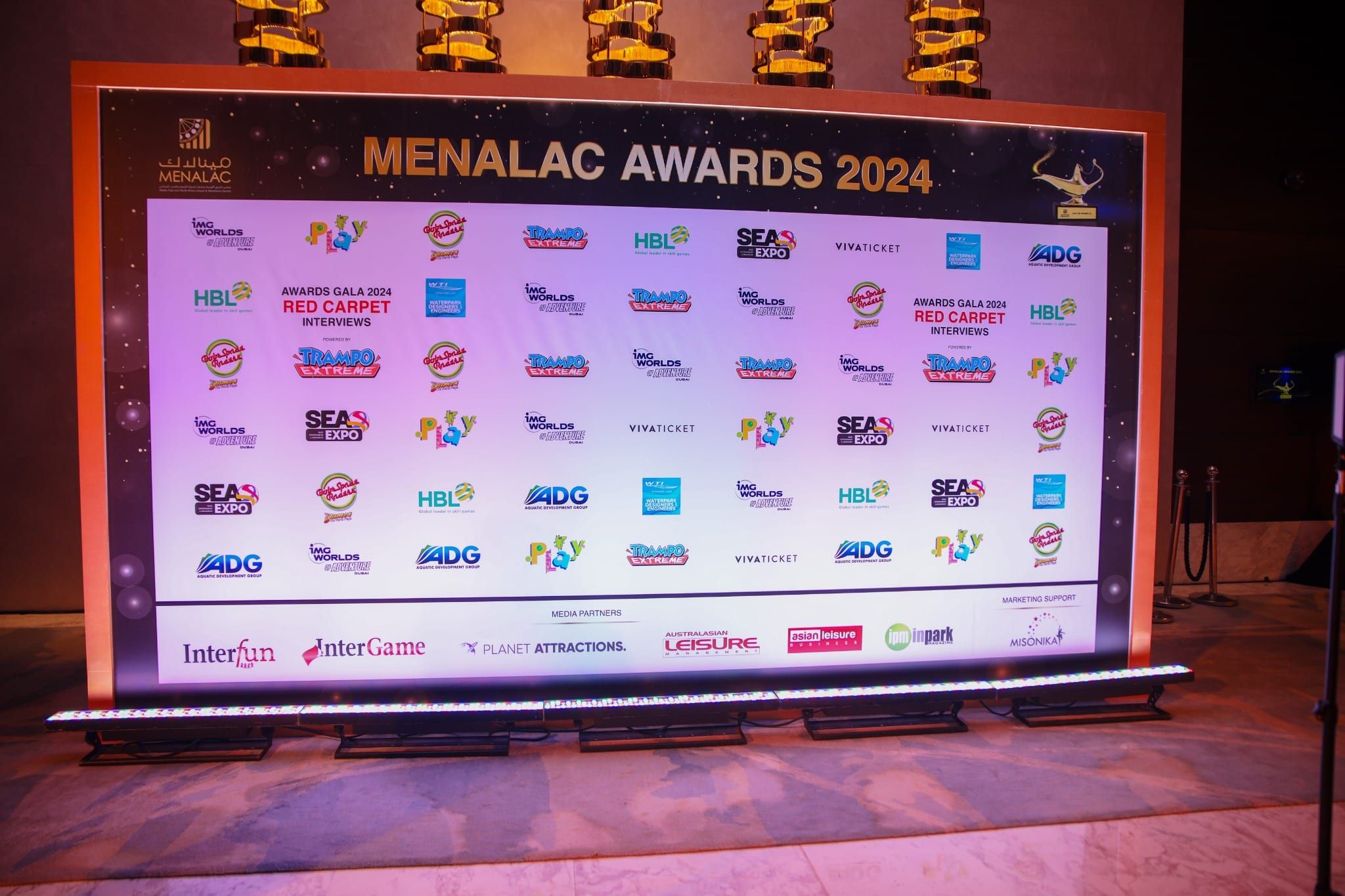 MENALAC Awards 2024 sponsor step-and-repeat wall
