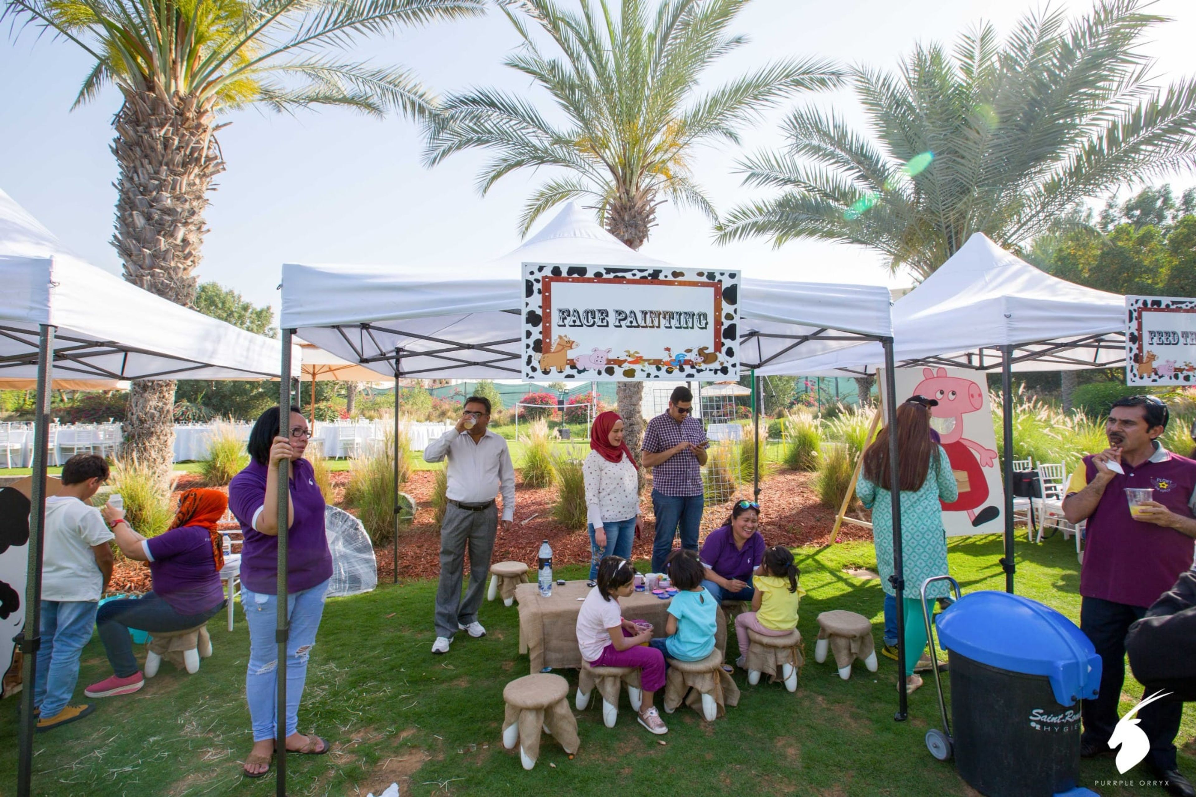 Face painting station for children at the Bioderma family day