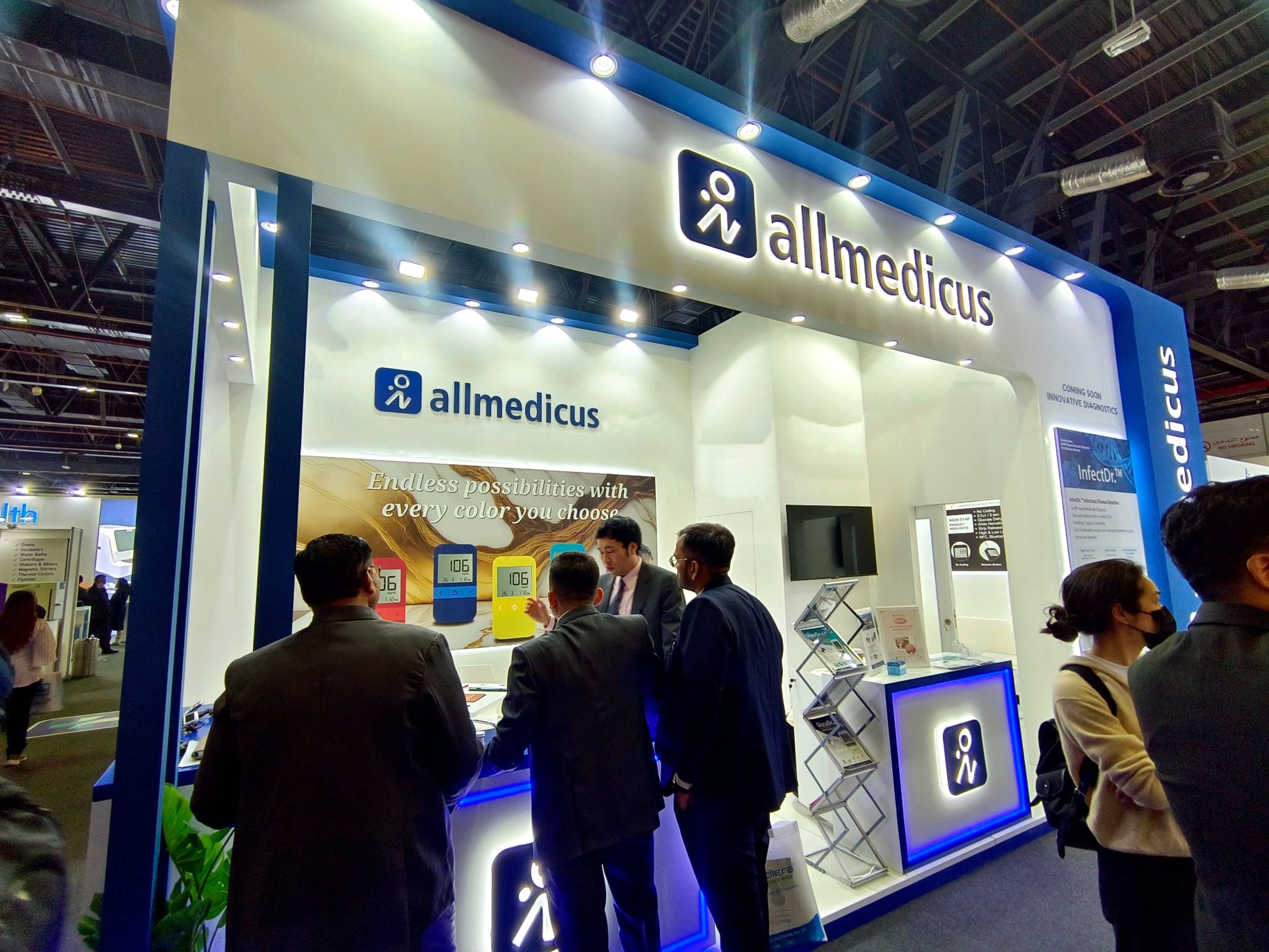 Visitors at the Allmedicus exhibition stand at a healthcare trade show in Dubai