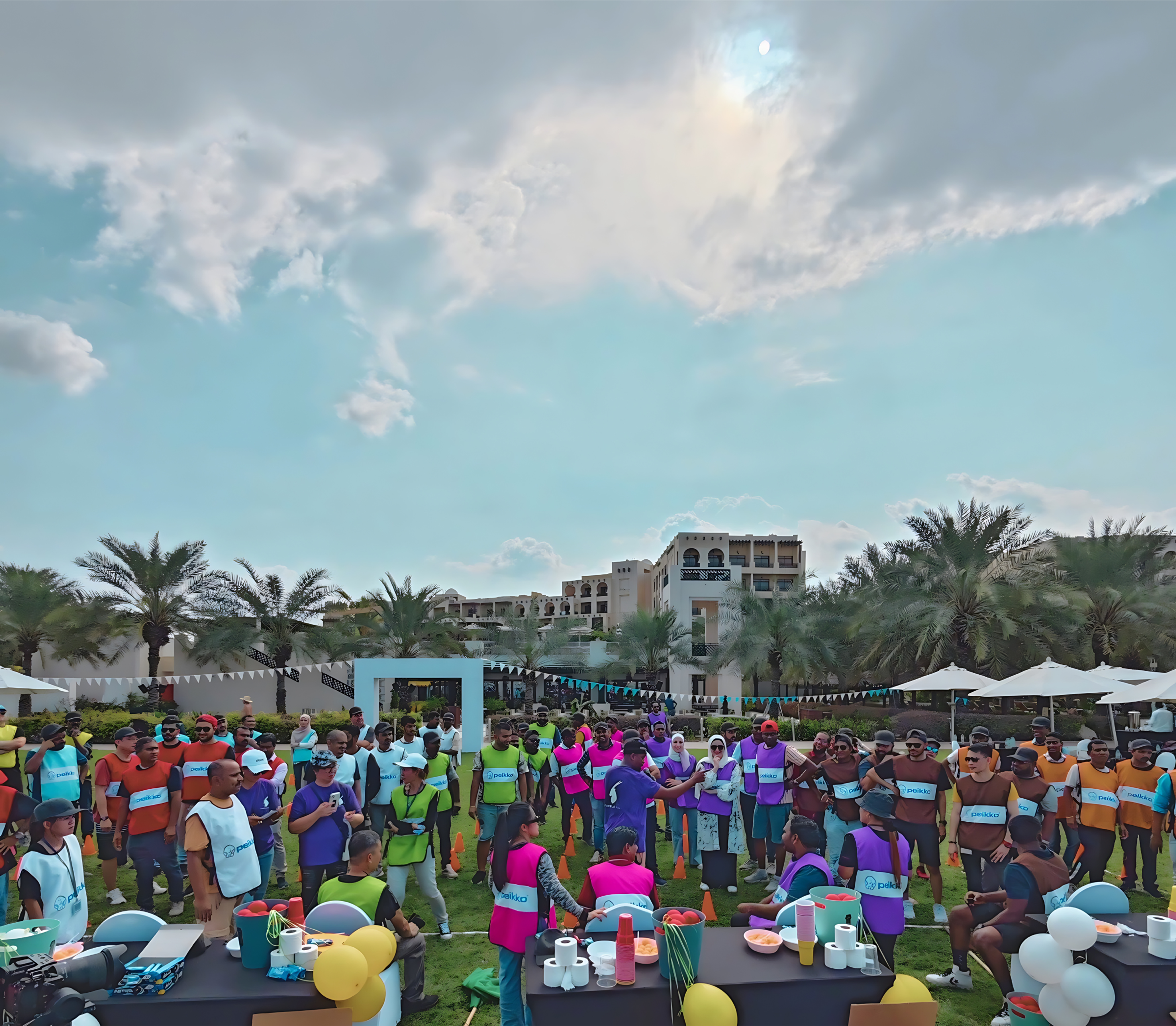 Group of employees volunteering together at a charity event, highlighting corporate social responsibility and team bonding